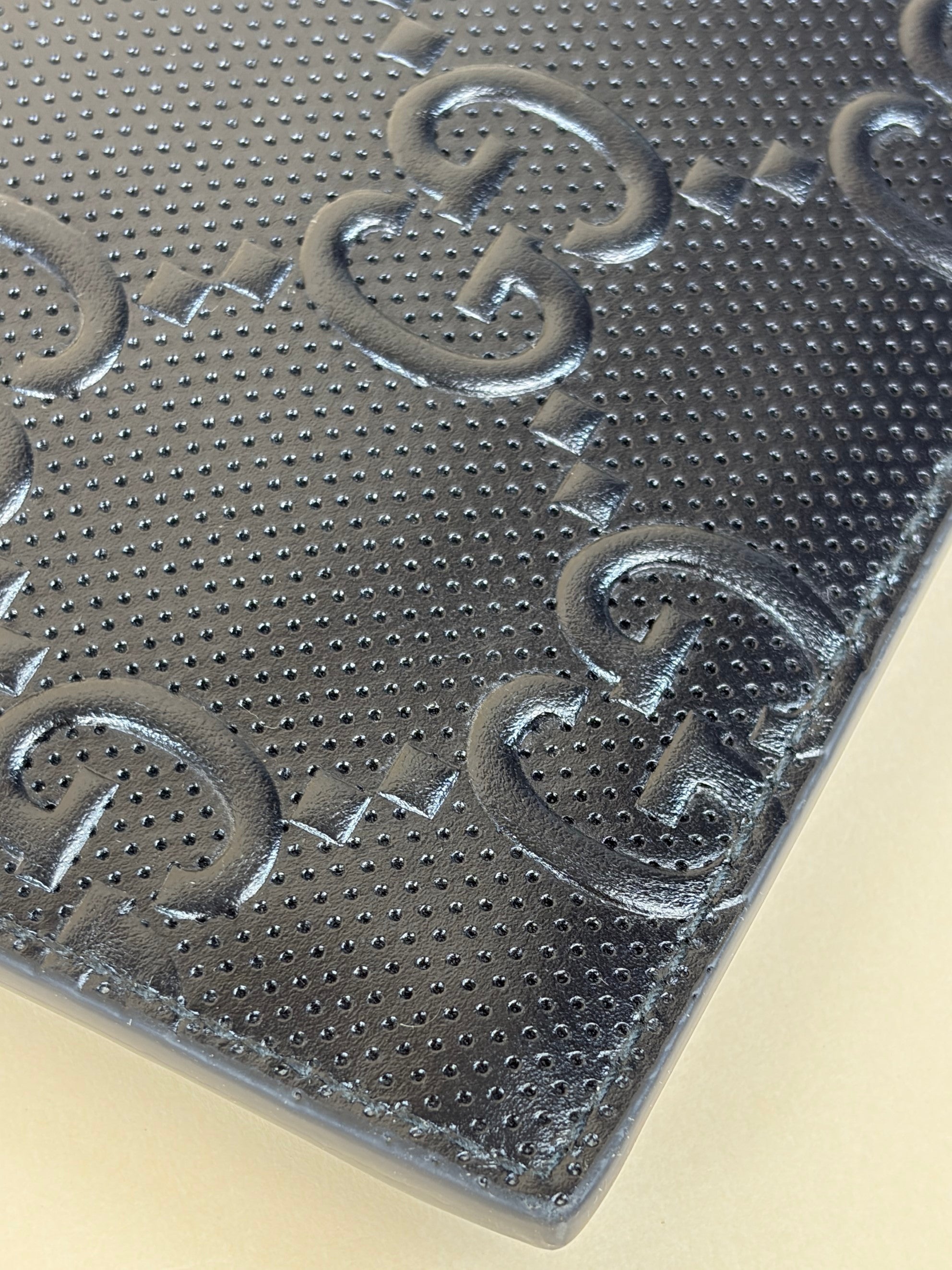 Gucci black Clutch calf skin gg tennis embossed wristlet pouch