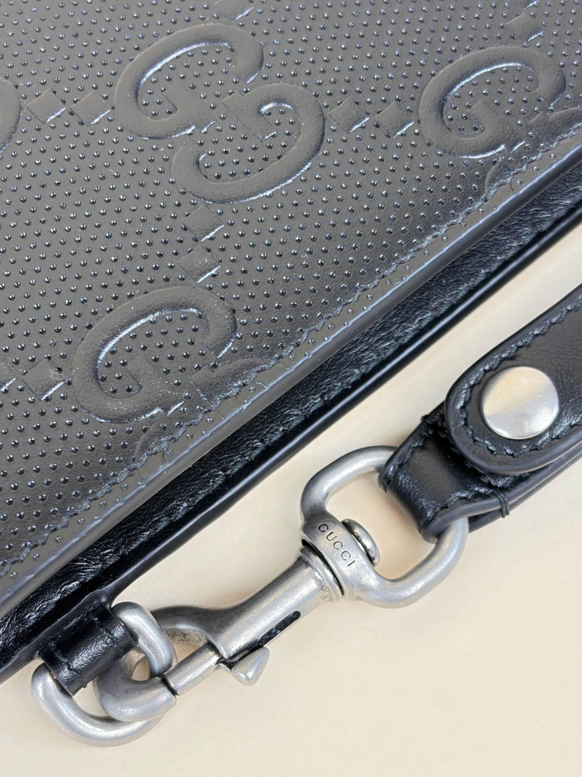 Gucci black Clutch calf skin gg tennis embossed wristlet pouch