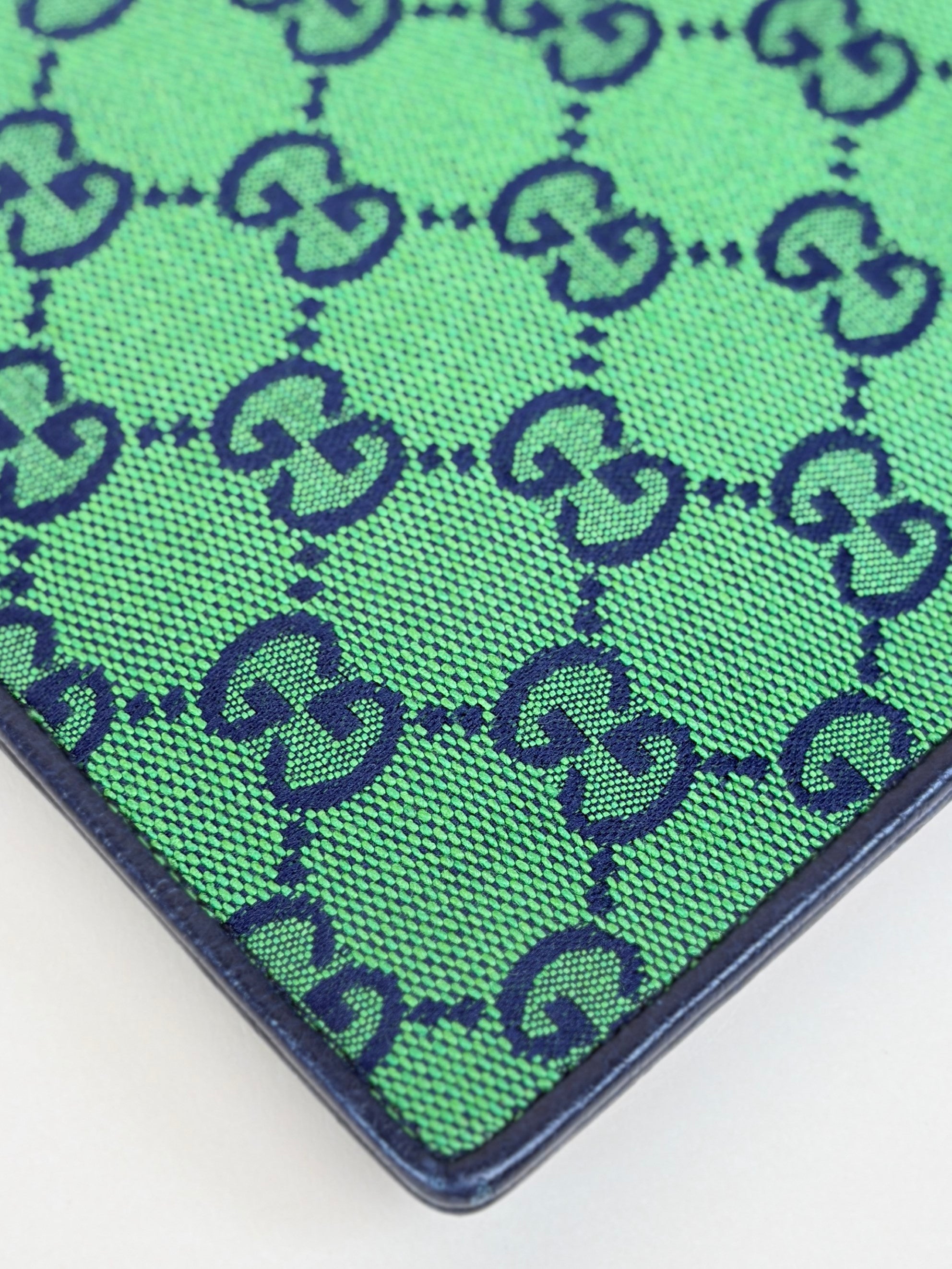 Gucci blue gg monogram multi color retro interlocking g wristlet pouch
