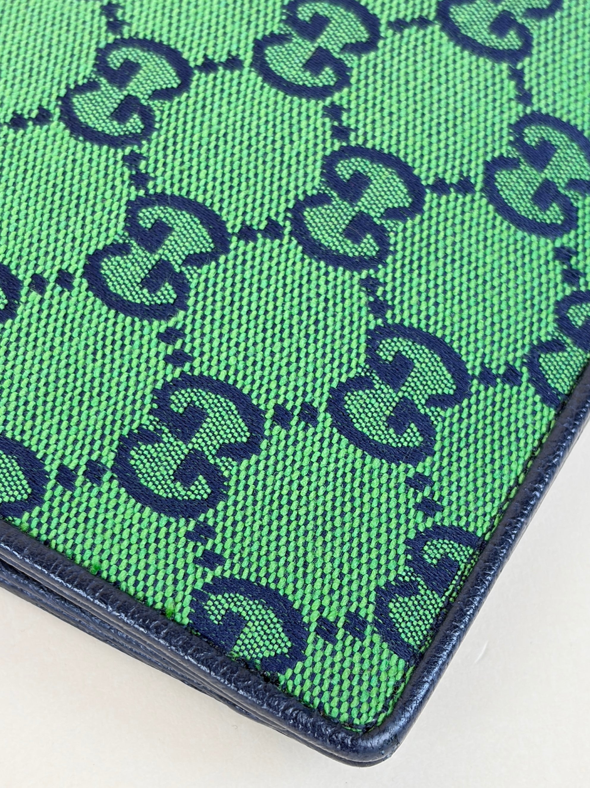 Gucci blue gg monogram multi color retro interlocking g wristlet pouch