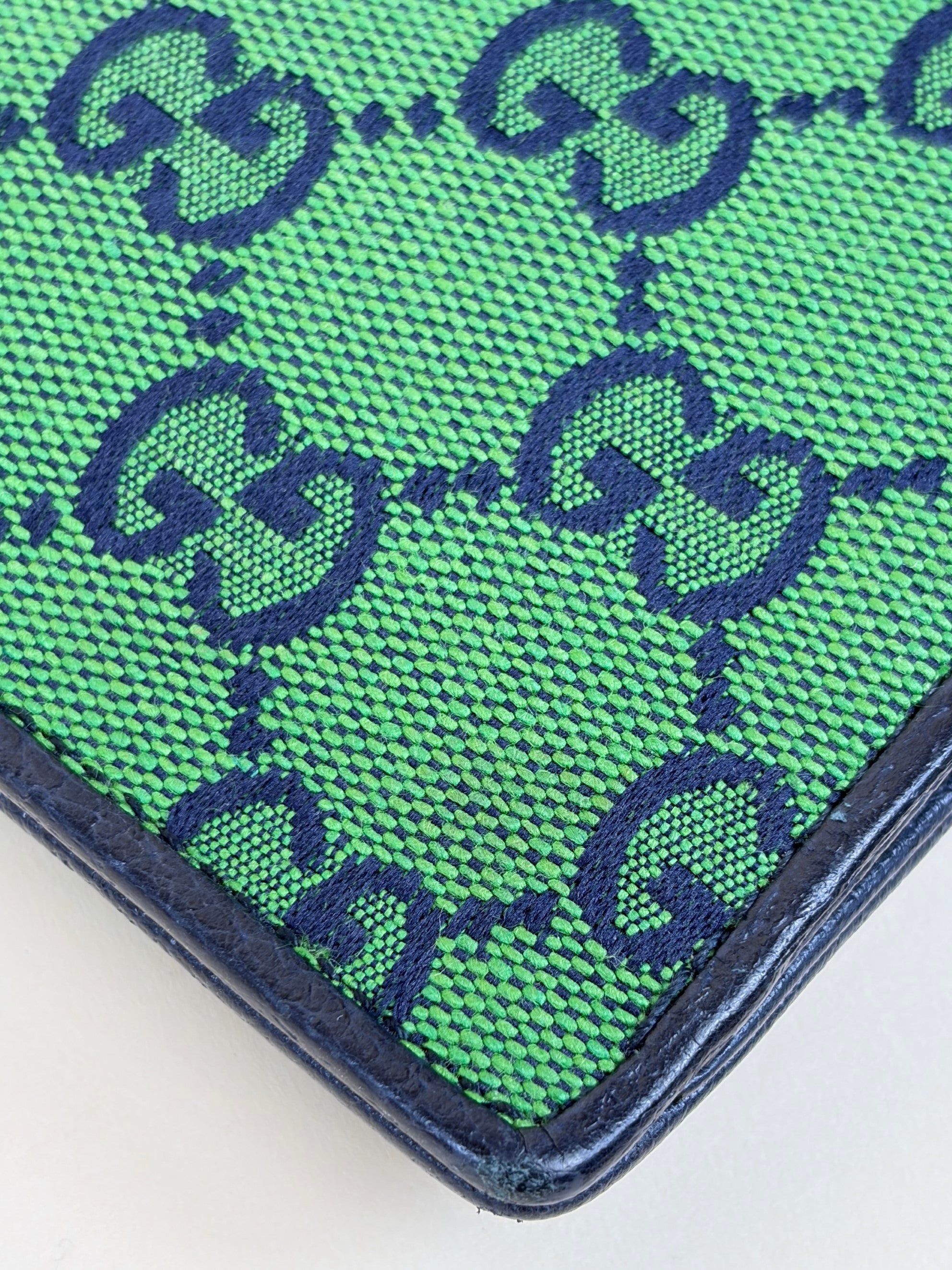 Gucci blue gg monogram multi color retro interlocking g wristlet pouch