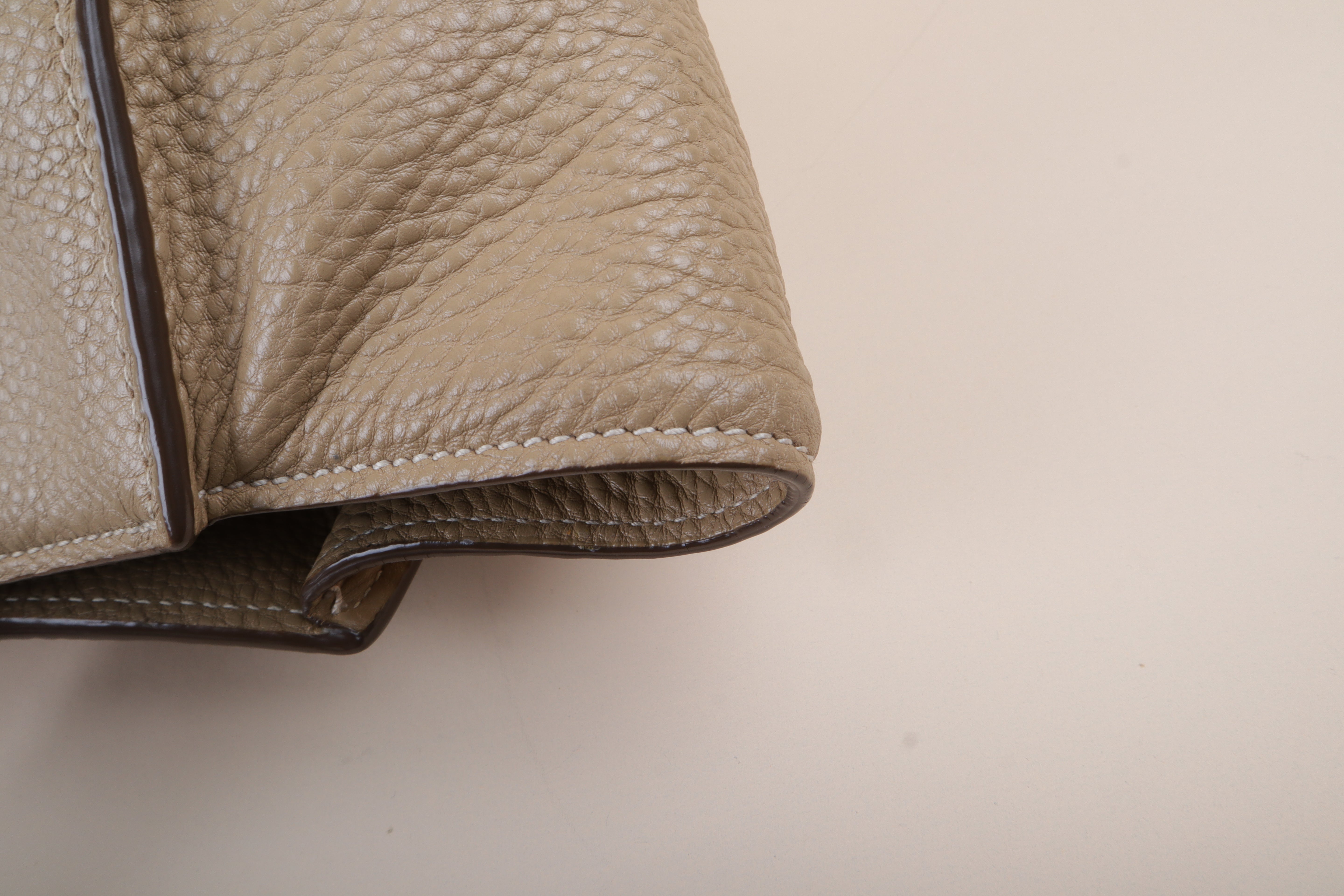 Prada beige front pocket wing convertible