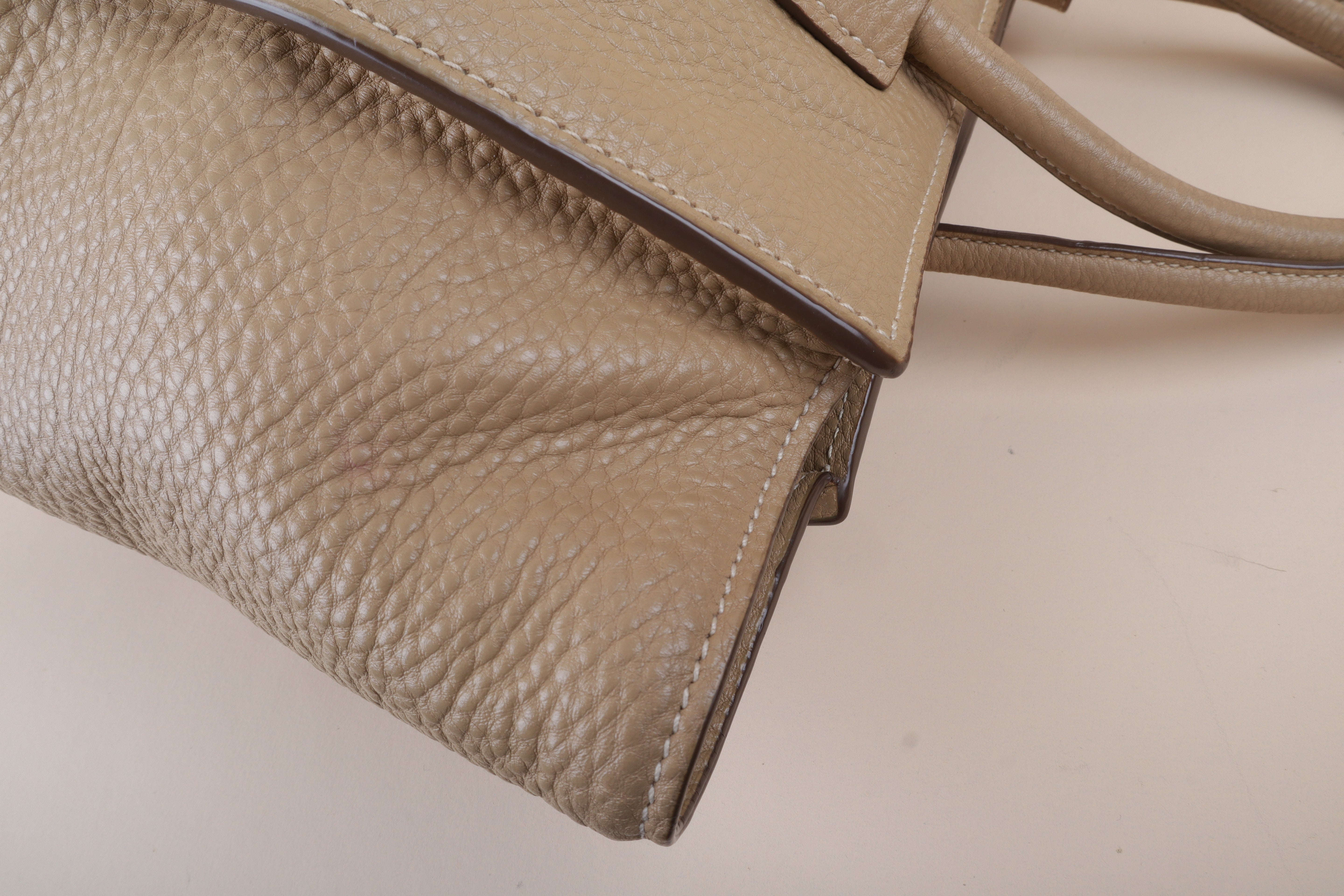 Prada beige front pocket wing convertible