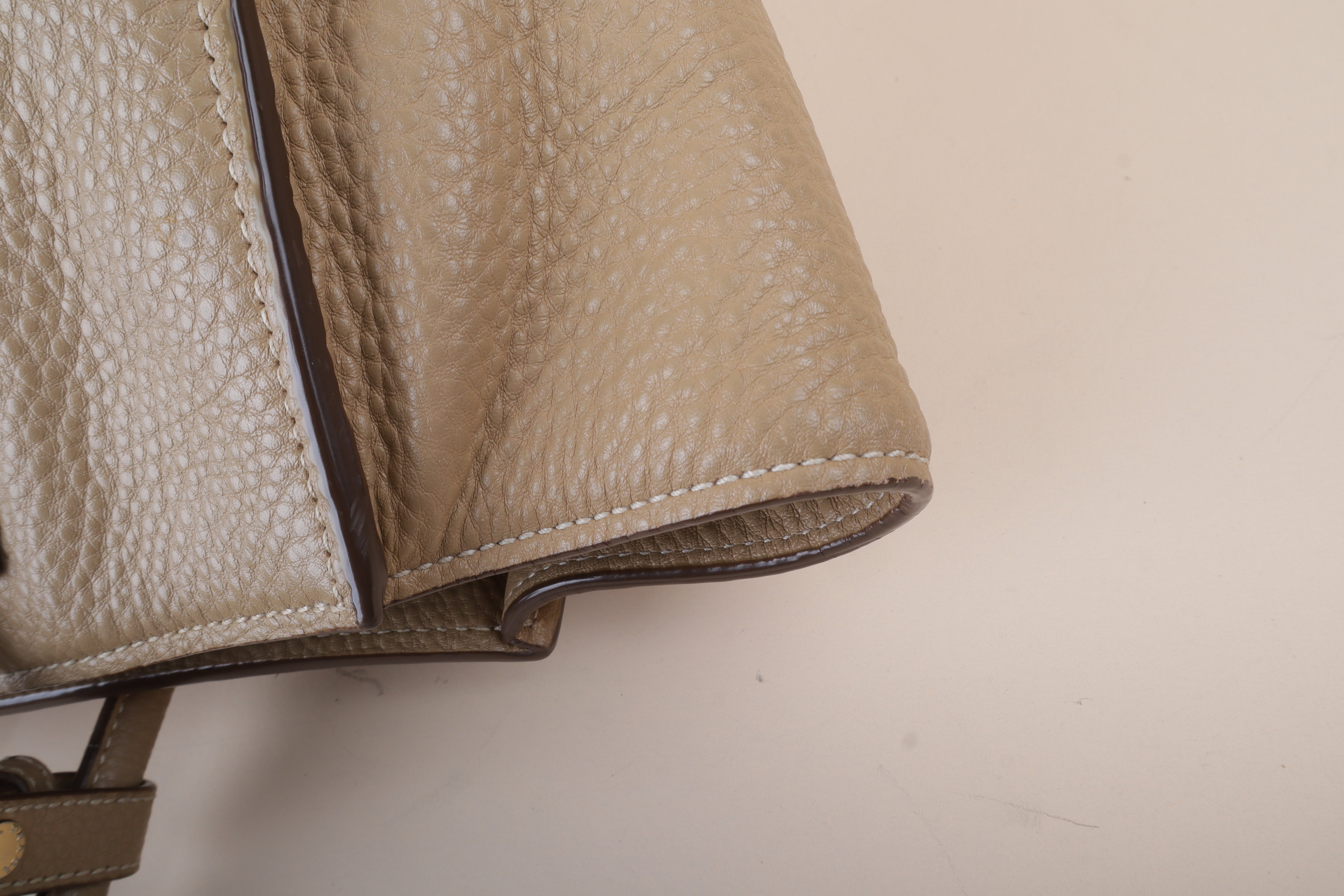 Prada beige front pocket wing convertible