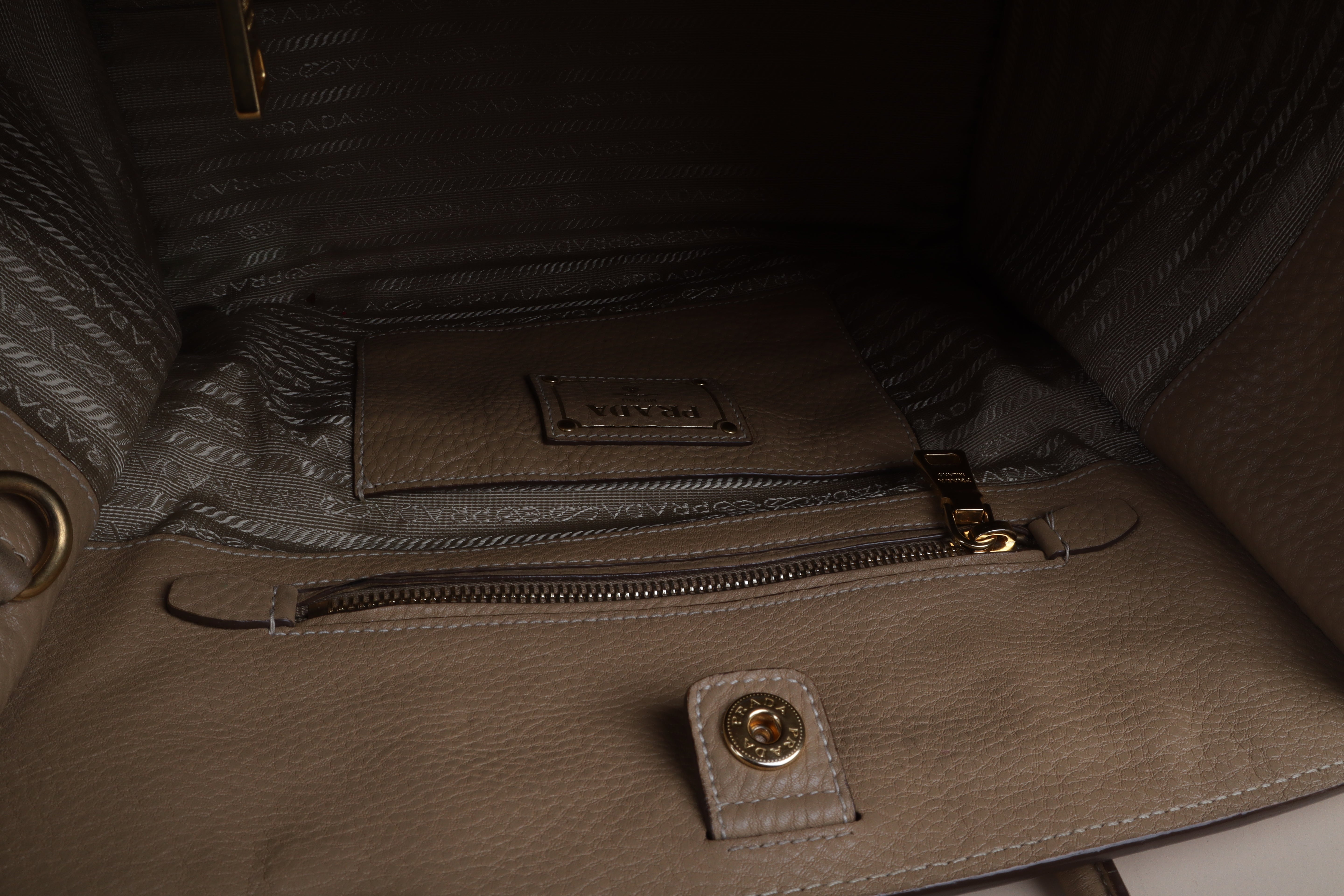 Prada beige front pocket wing convertible