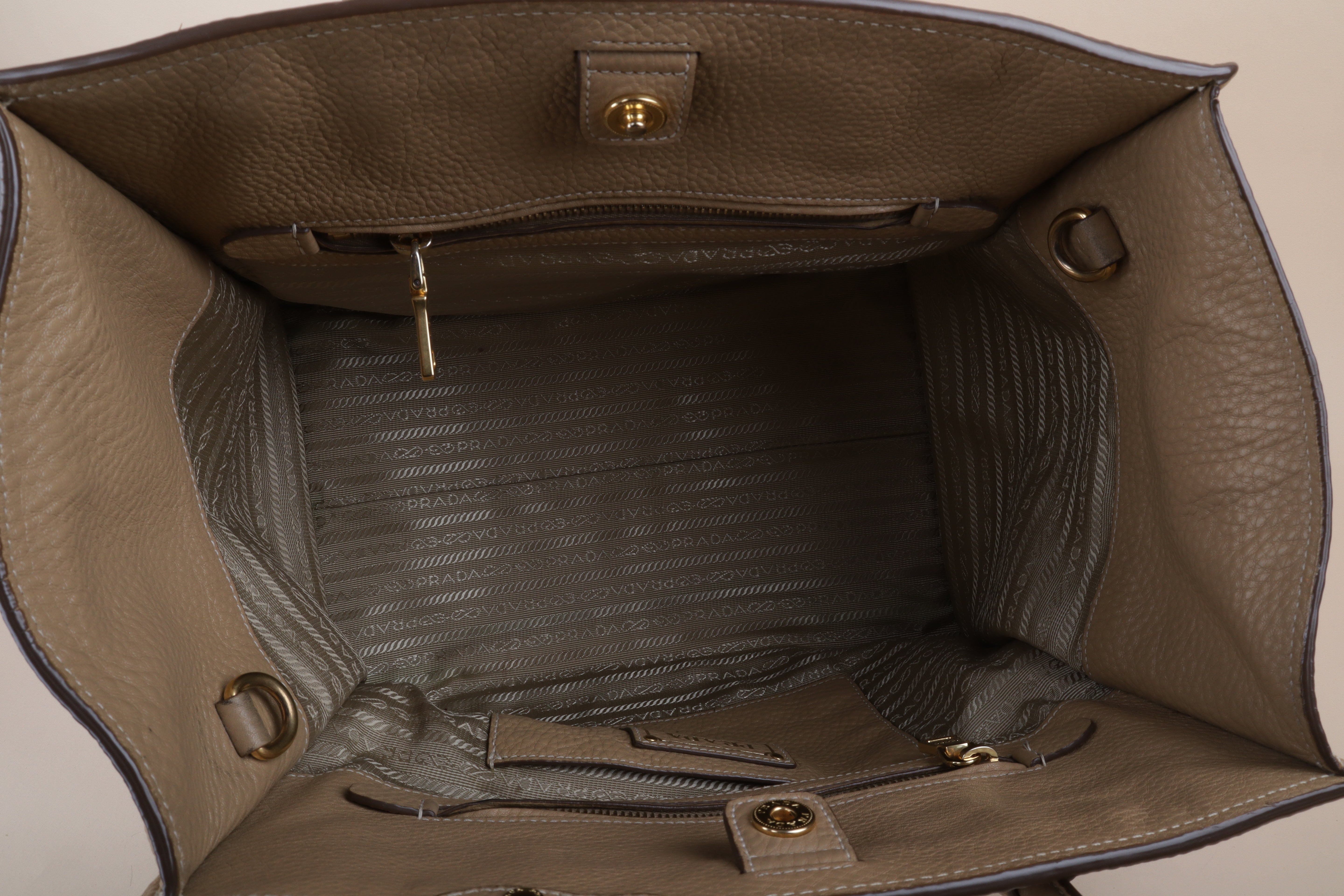 Prada beige front pocket wing convertible