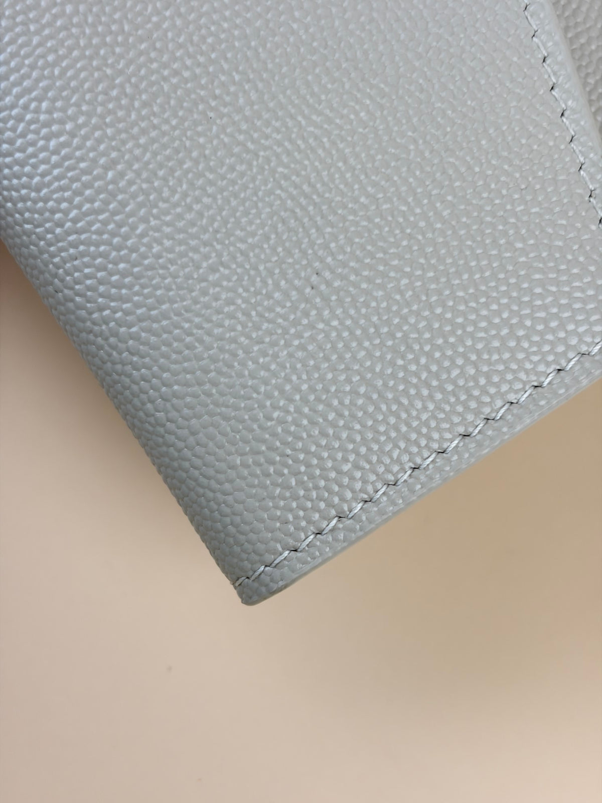 YSL white grain de Poudre leather Uptown pouch