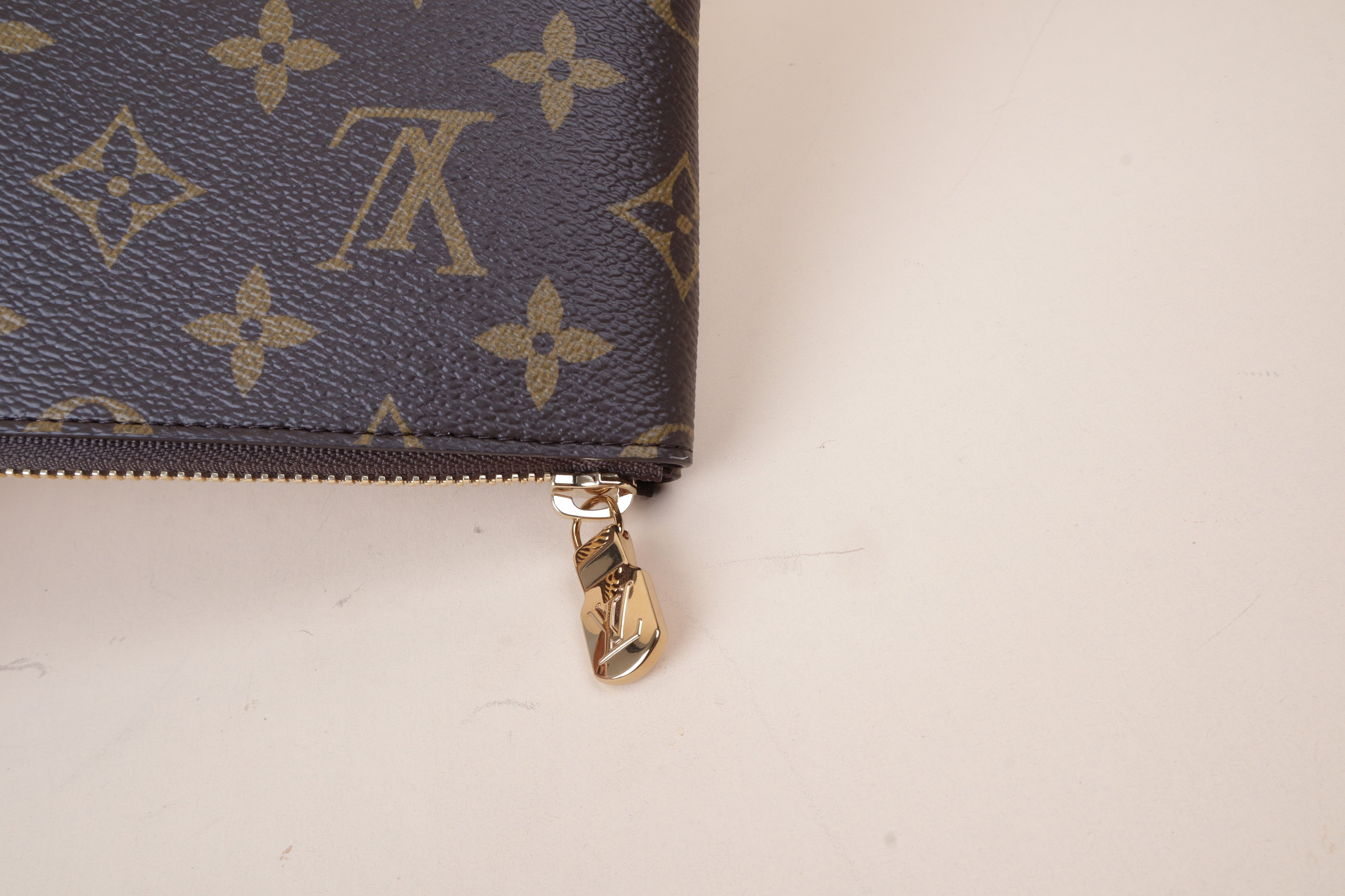 Louis Vuitton key l Monogram Zip Clutch
