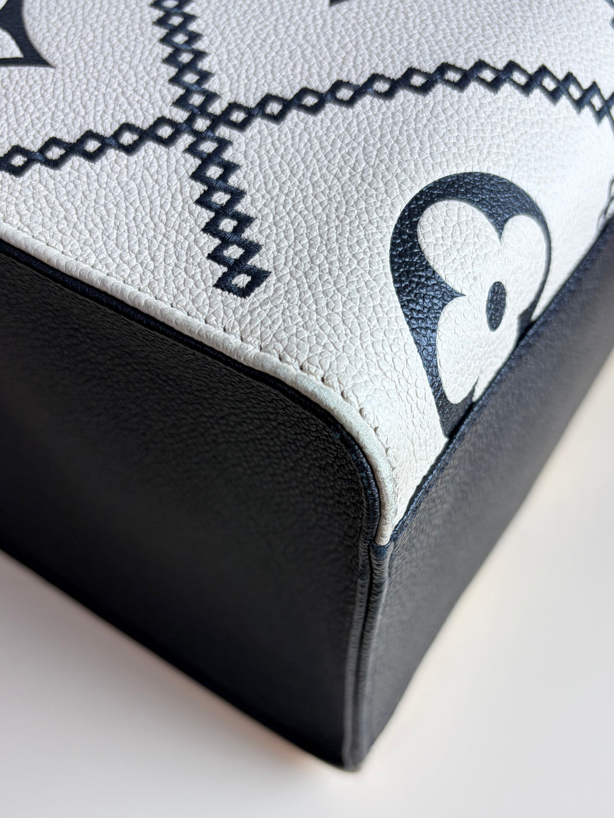 Louis Vuitton black/cream monogram empriente broderies on the go mm tote bag