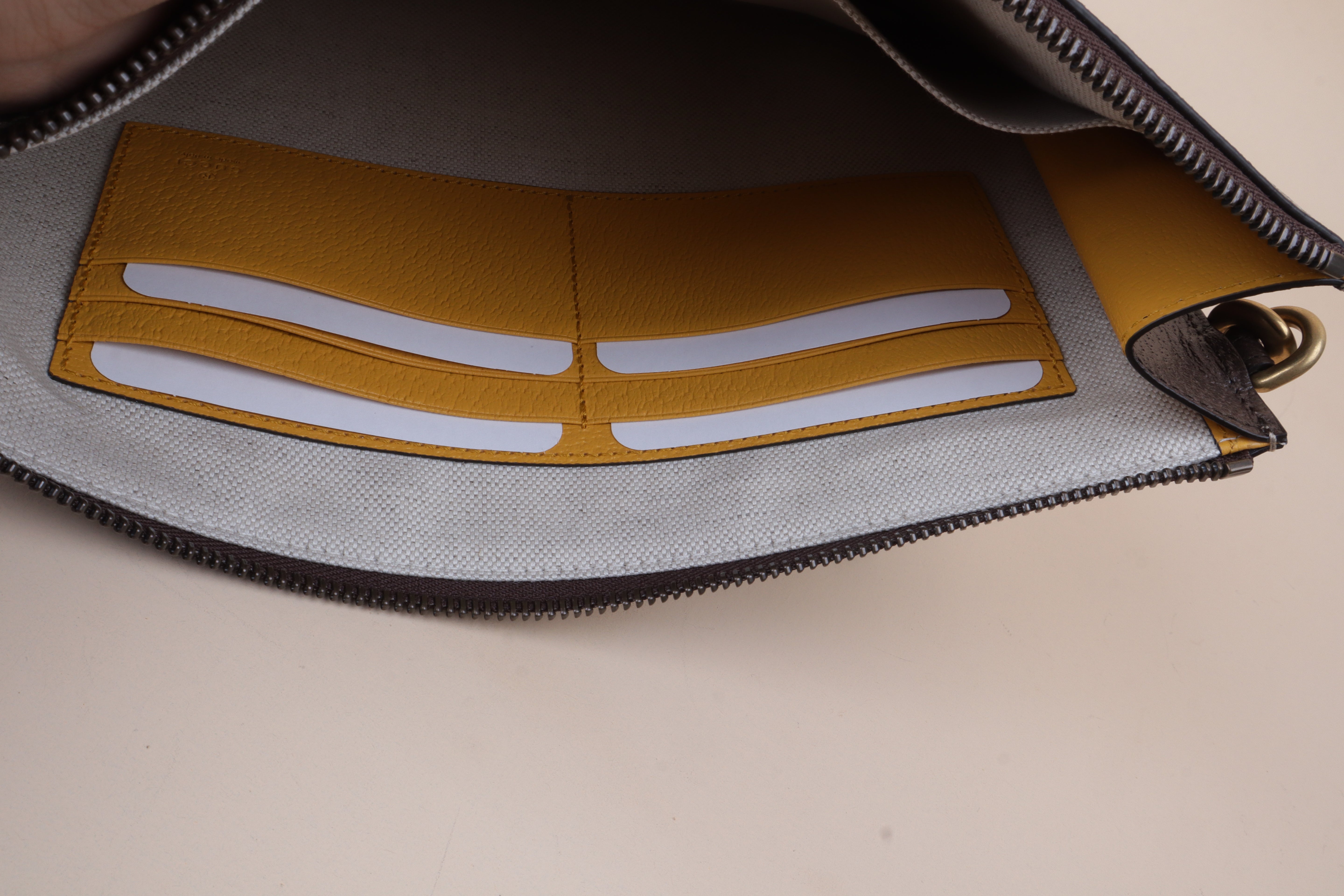 Gucci beige GG Pouch-wristlet-Gucci-The Closet Egypt