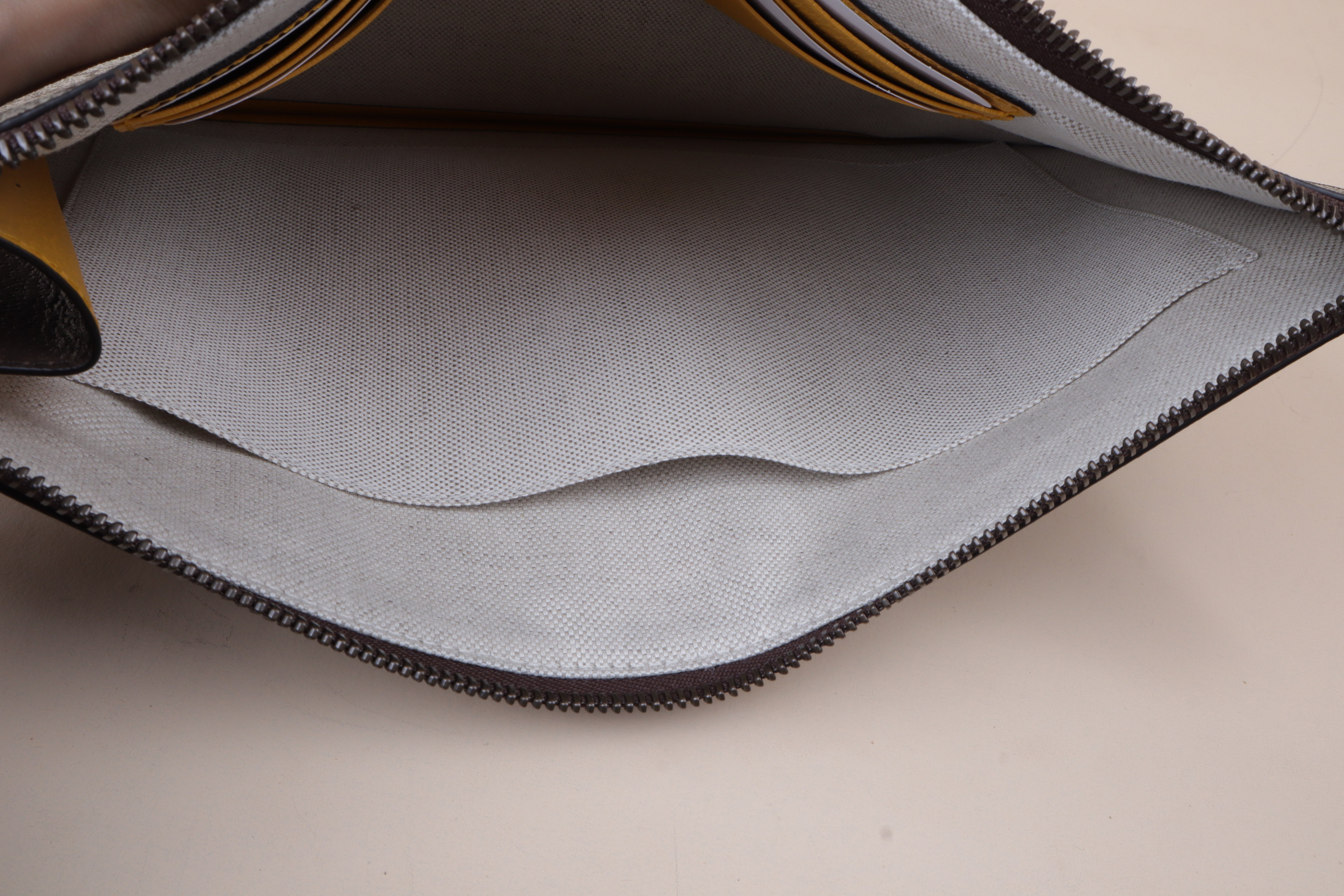 Gucci beige GG Pouch