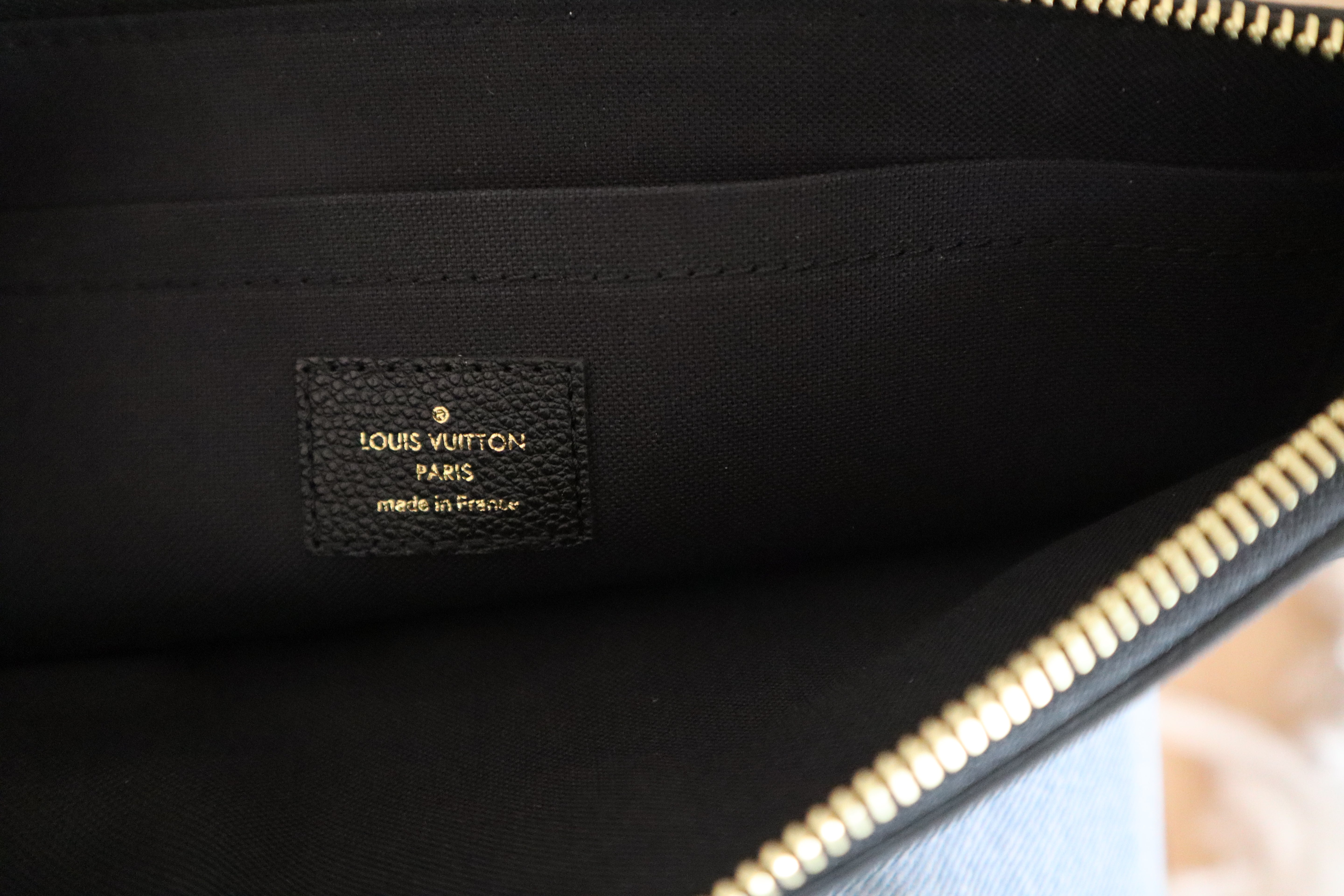 Louis Vuitton Black Monogram Empreinte Daily Pouch-Pouch-Louis Vuitton-The Closet Egypt