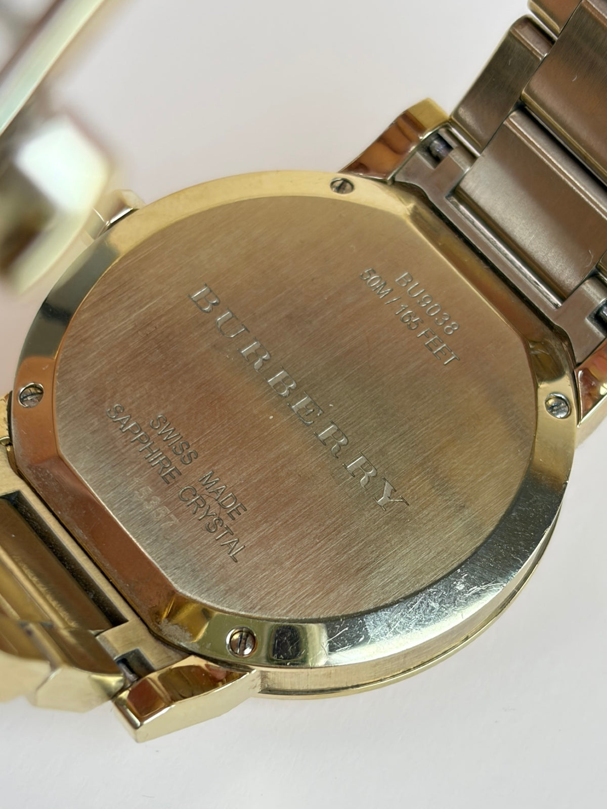 Burberry the city Gold Watch tone