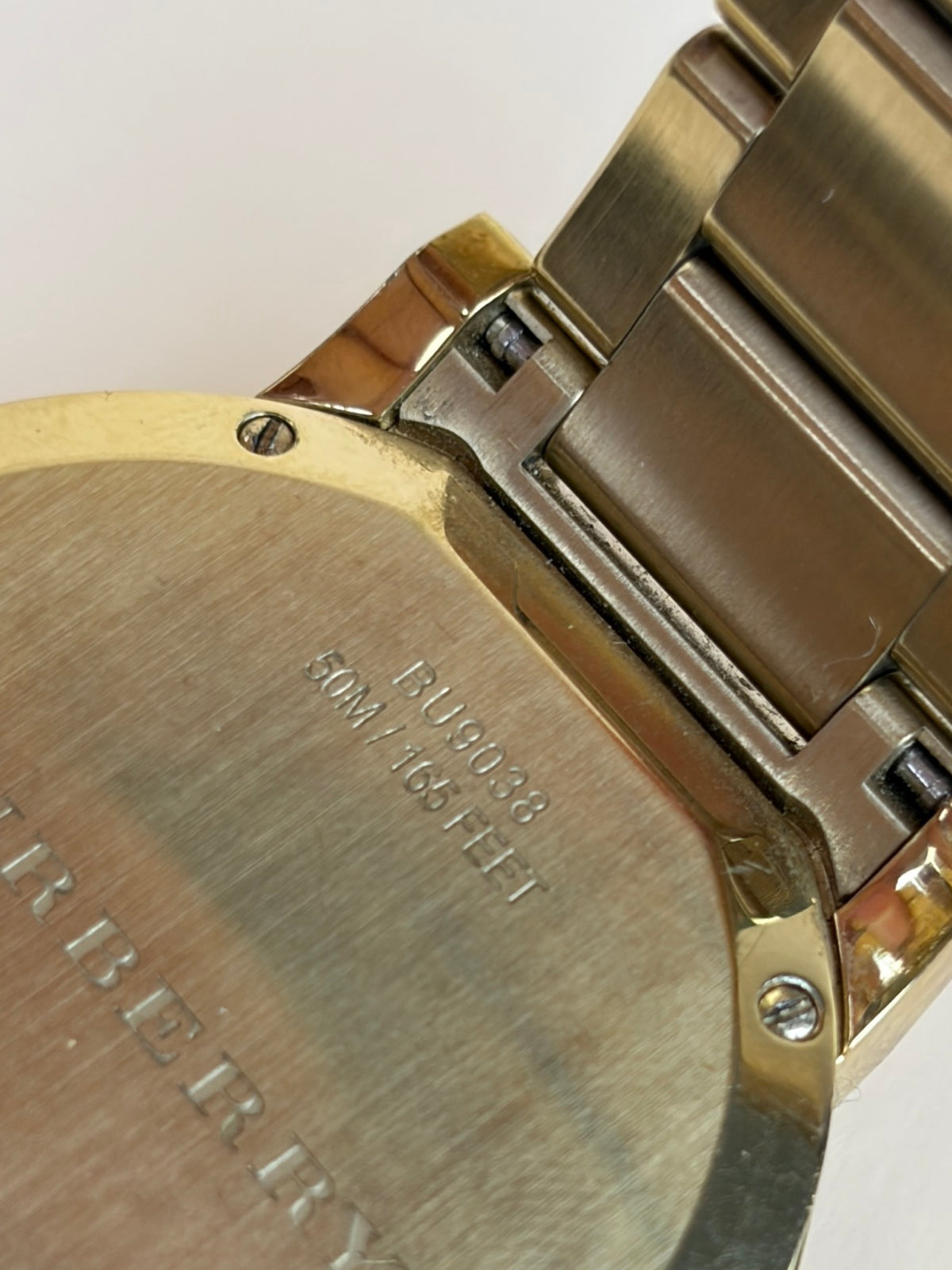 Burberry the city Gold Watch tone