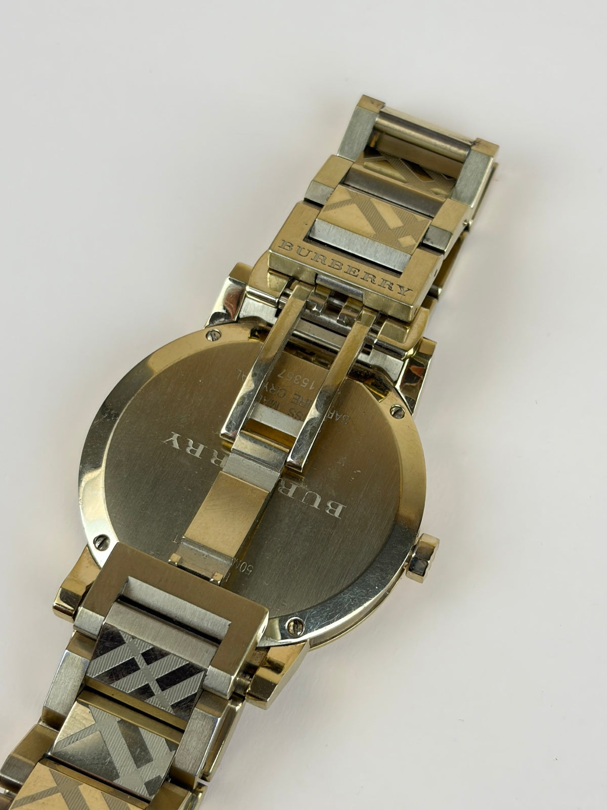 Burberry the city Gold Watch tone