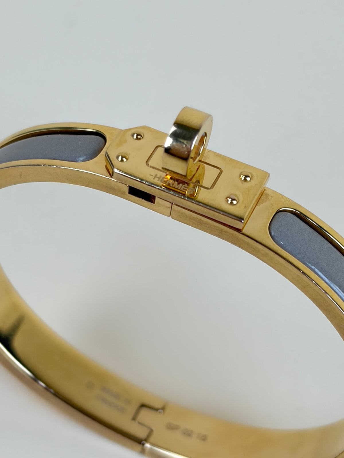 Hermes rose gold plated maron glace mini clic kelly bracelet