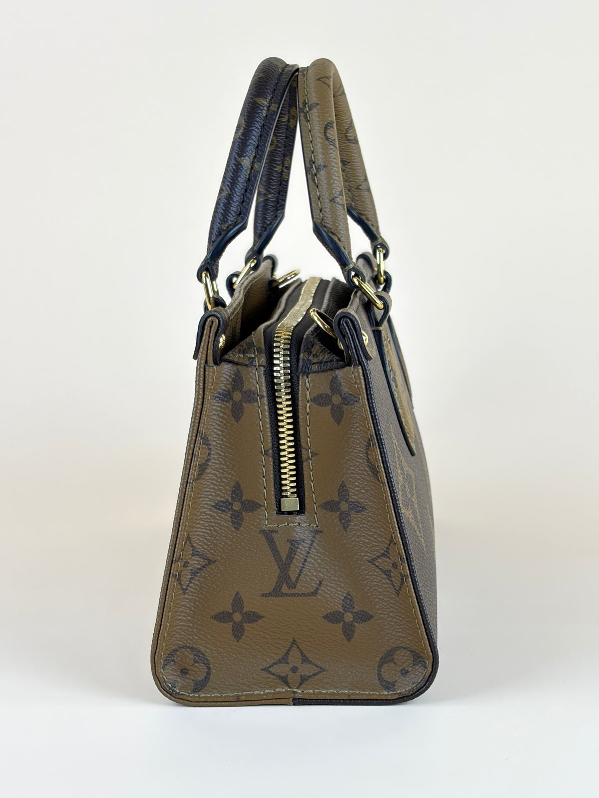 Louis Vuitton monogram reverse canvas on the go east-west tote bag