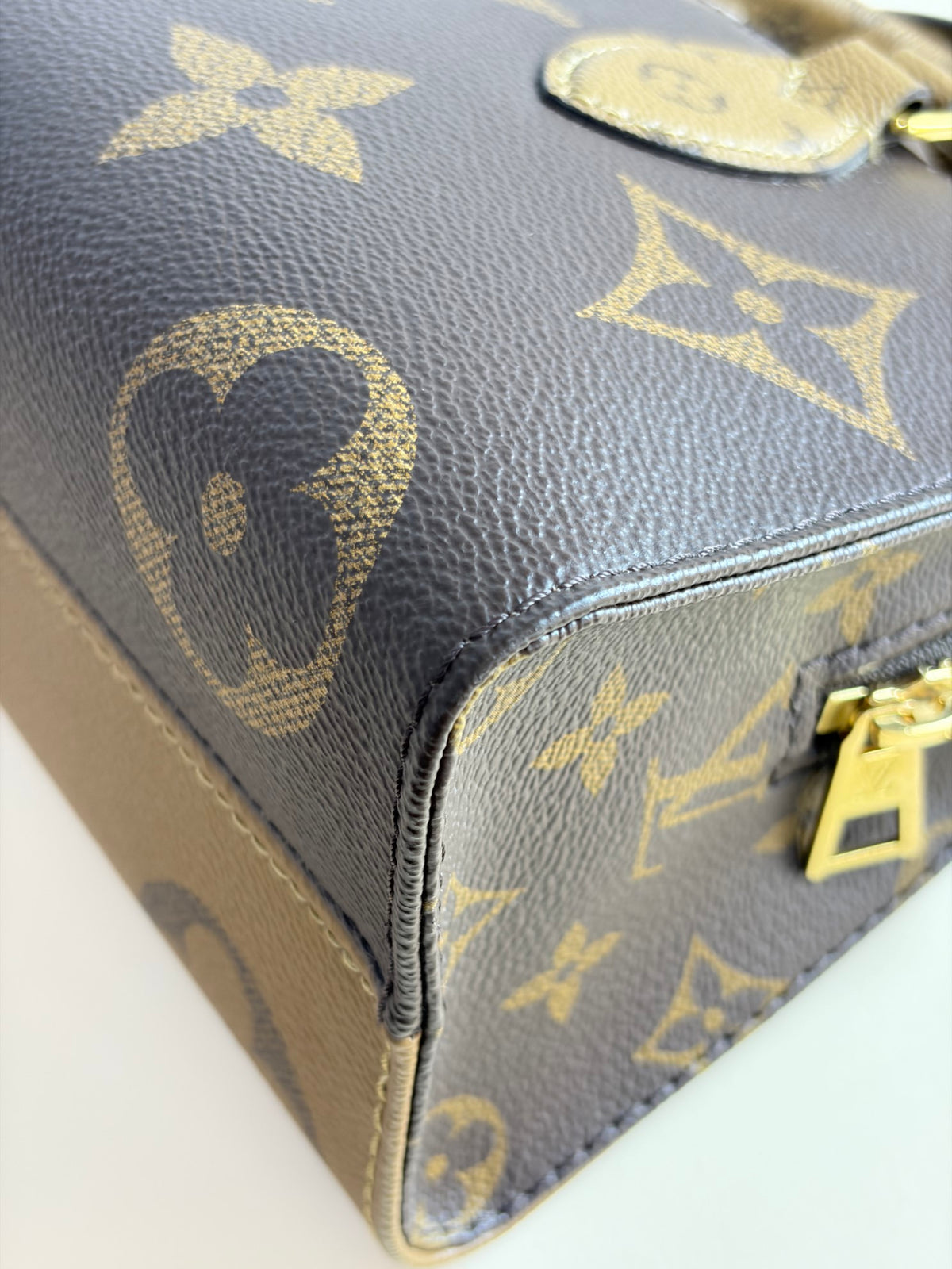 Louis Vuitton monogram reverse canvas on the go east-west tote bag