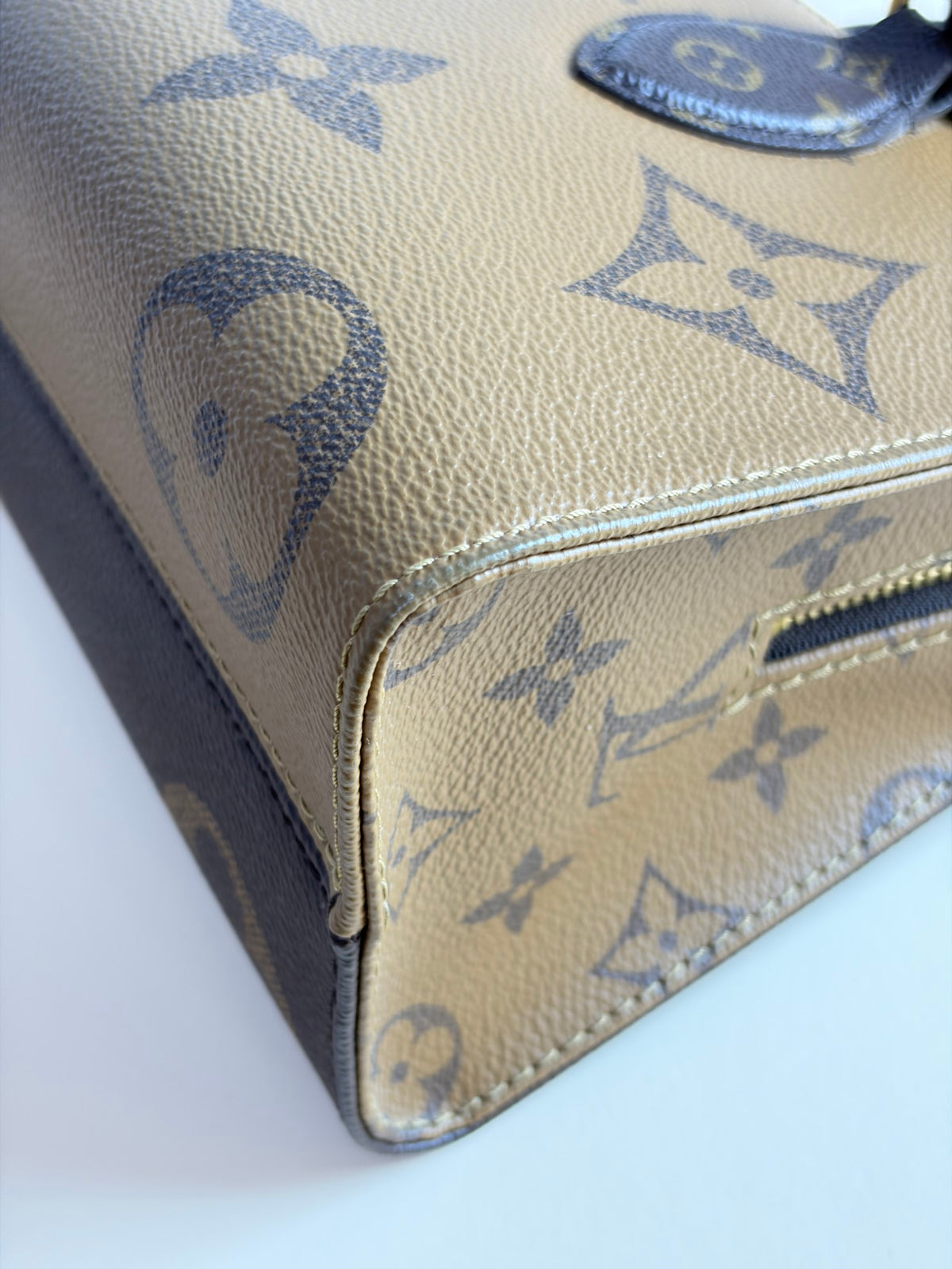 Louis Vuitton monogram reverse canvas on the go east-west tote bag