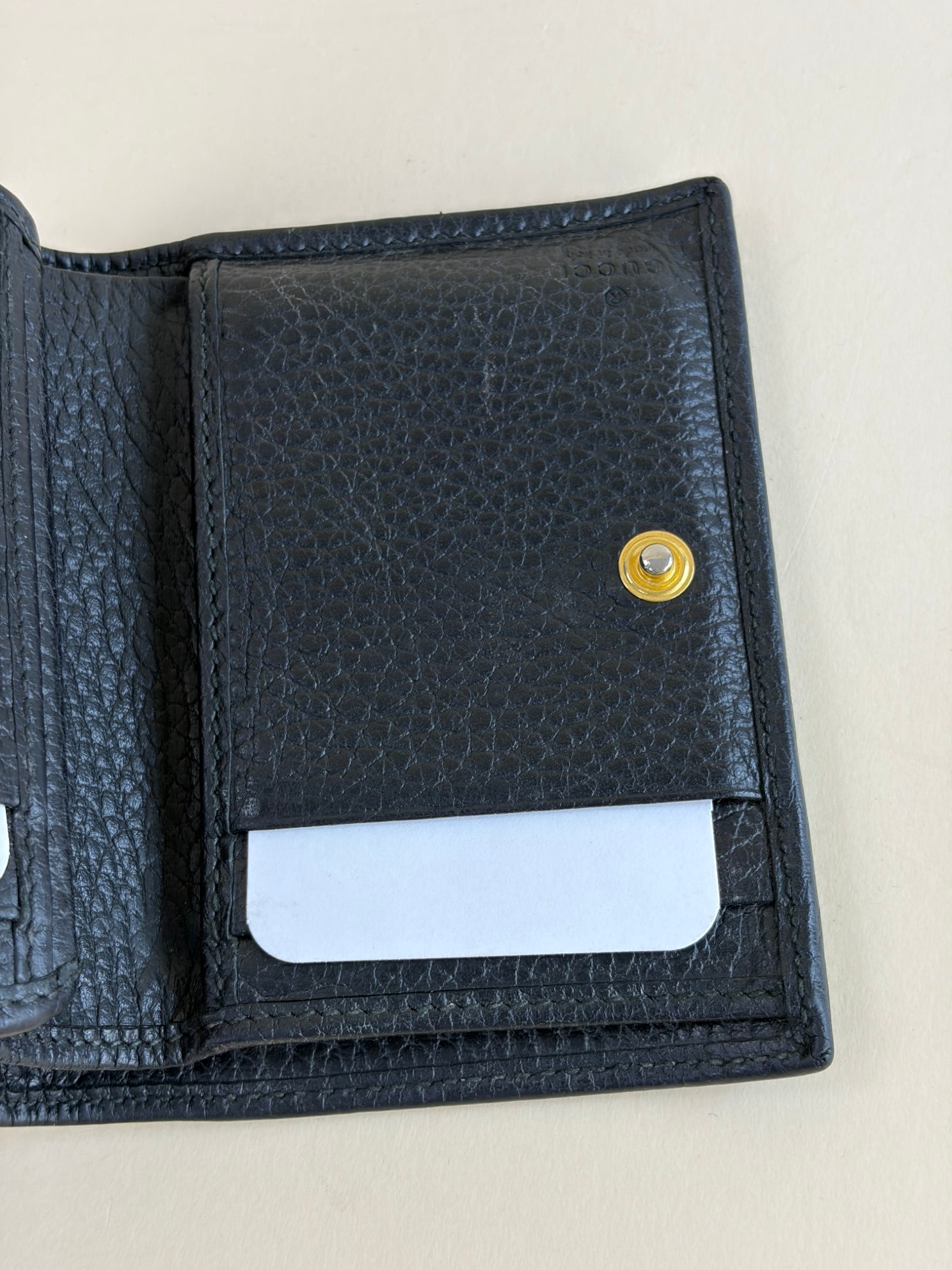 Gucci Black GG Marmont tri- fold compact wallet gold hardware