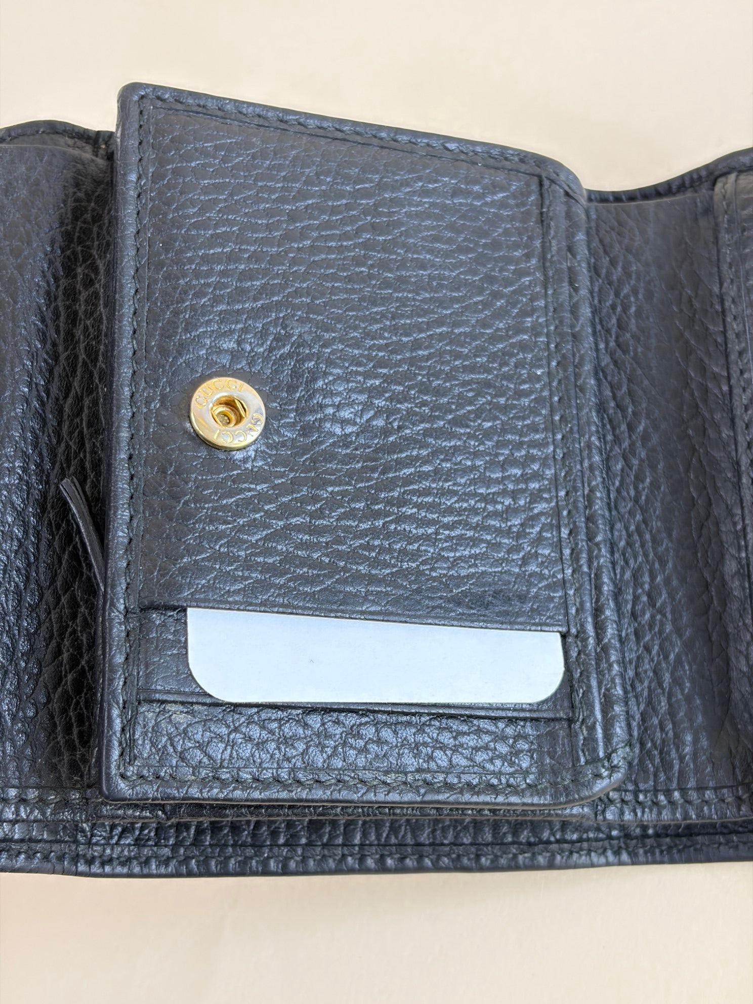 Gucci Black GG Marmont tri- fold compact wallet gold hardware