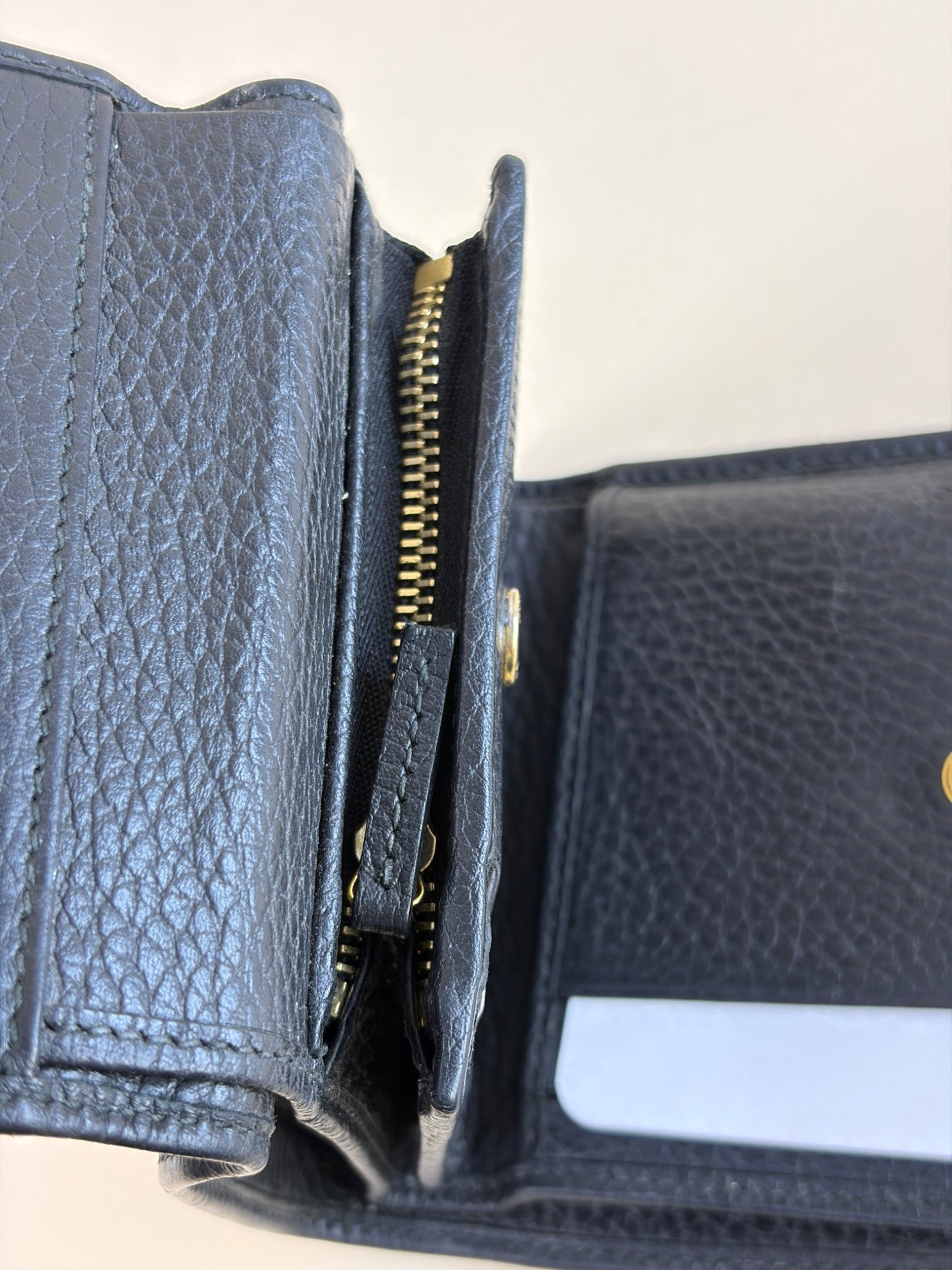 Gucci Black GG Marmont tri- fold compact wallet gold hardware