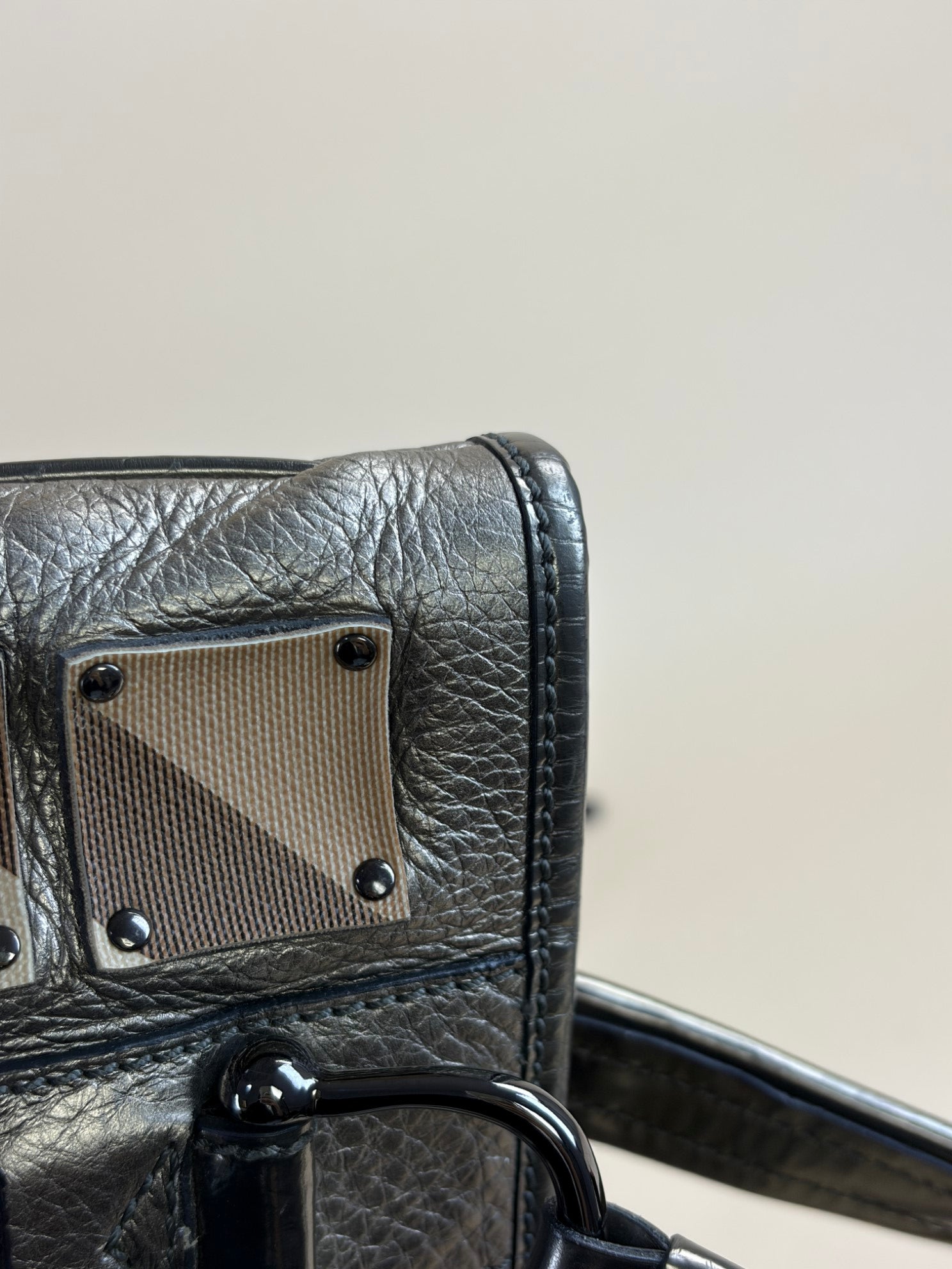 BURBERRY studded brook warrior nova check canvas