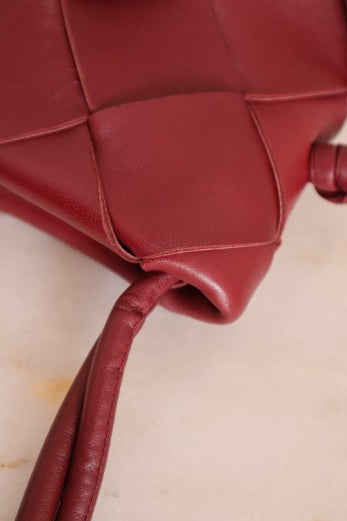 Bottega Veneta Burgundy Intrecciato Clasp Bucket Bag-handbag-Bottega Veneta-The Closet Egypt