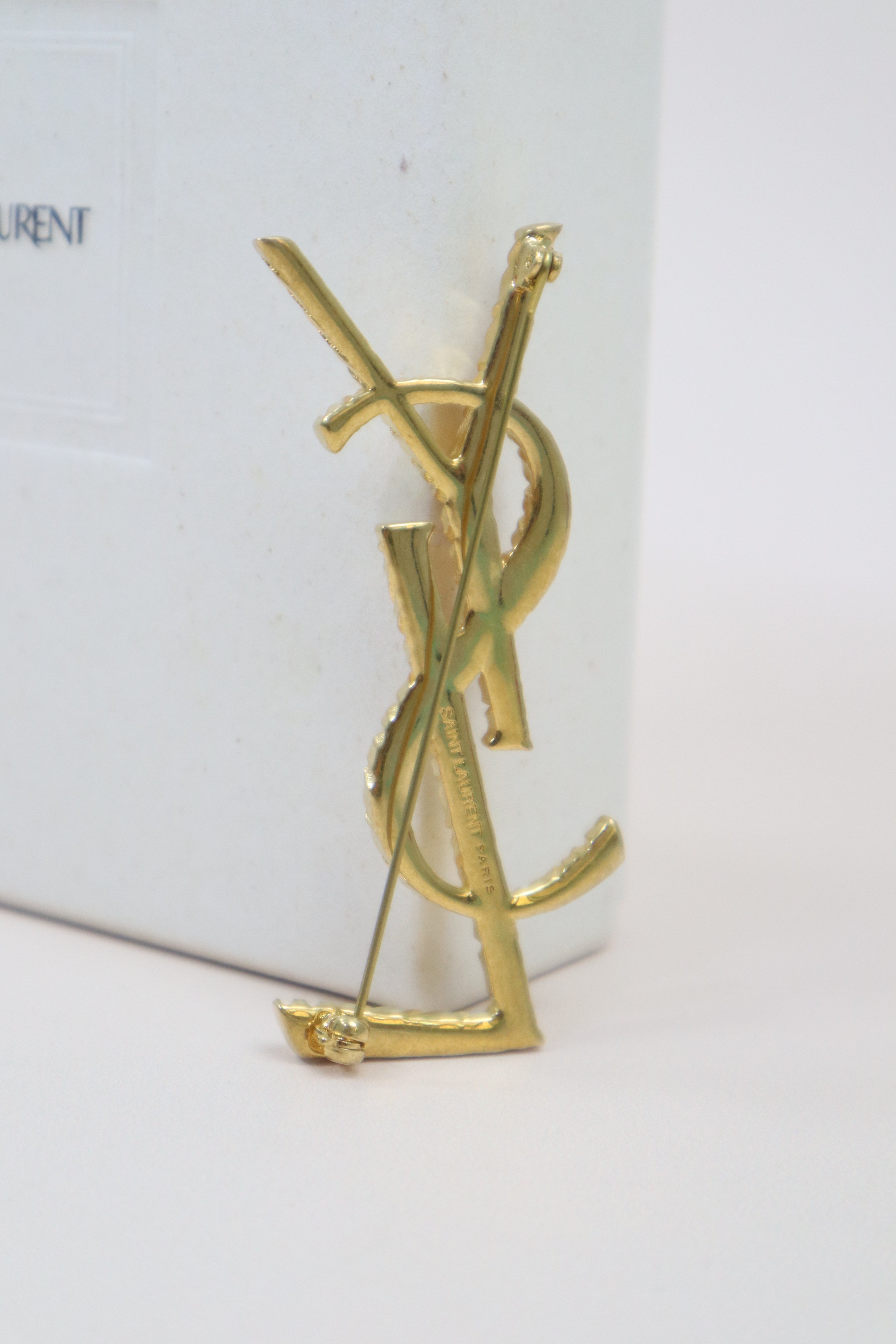 YSL Gold Logo Brooch