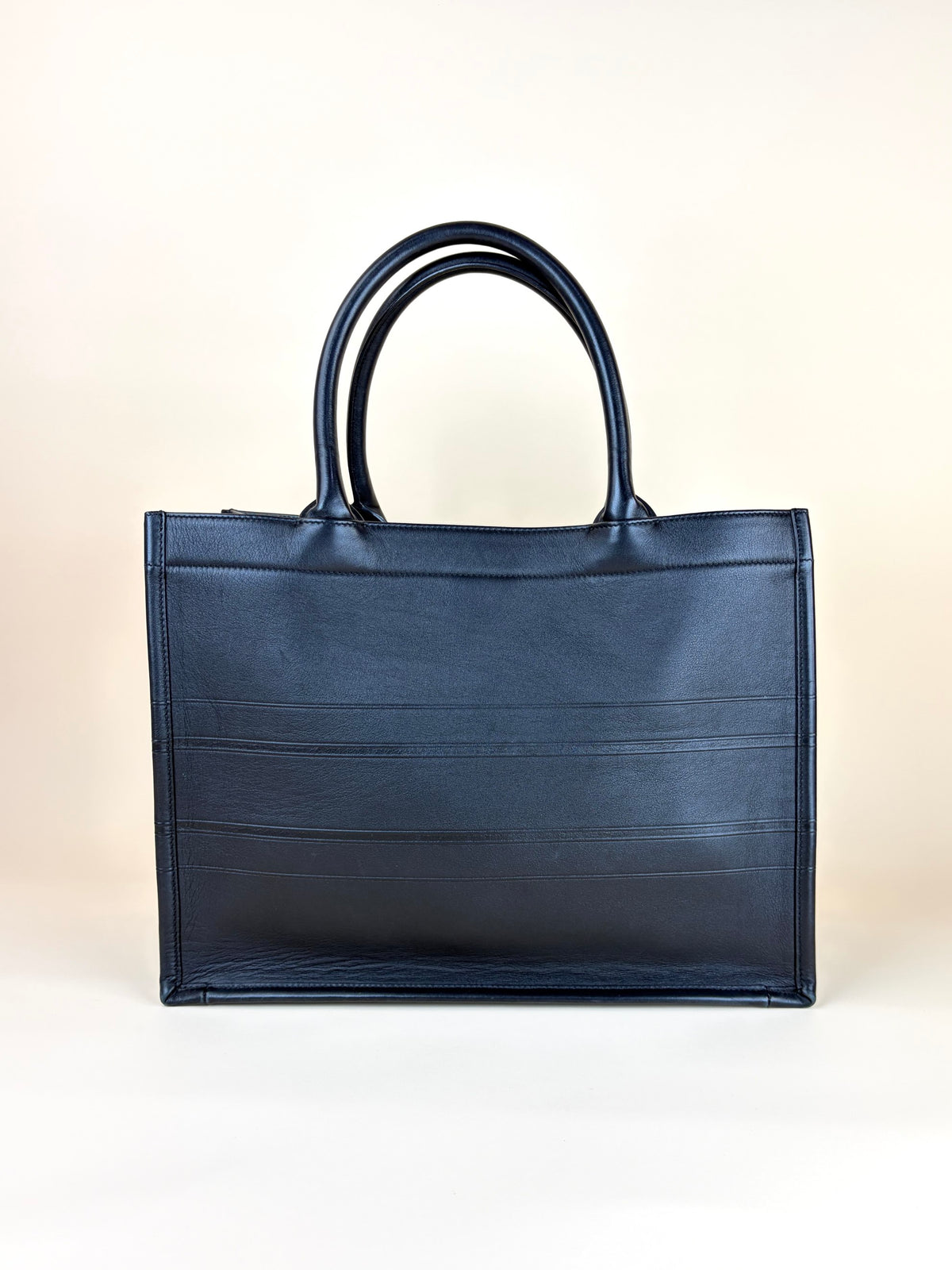 Christian Dior medium black calfskin embossed book tote bag