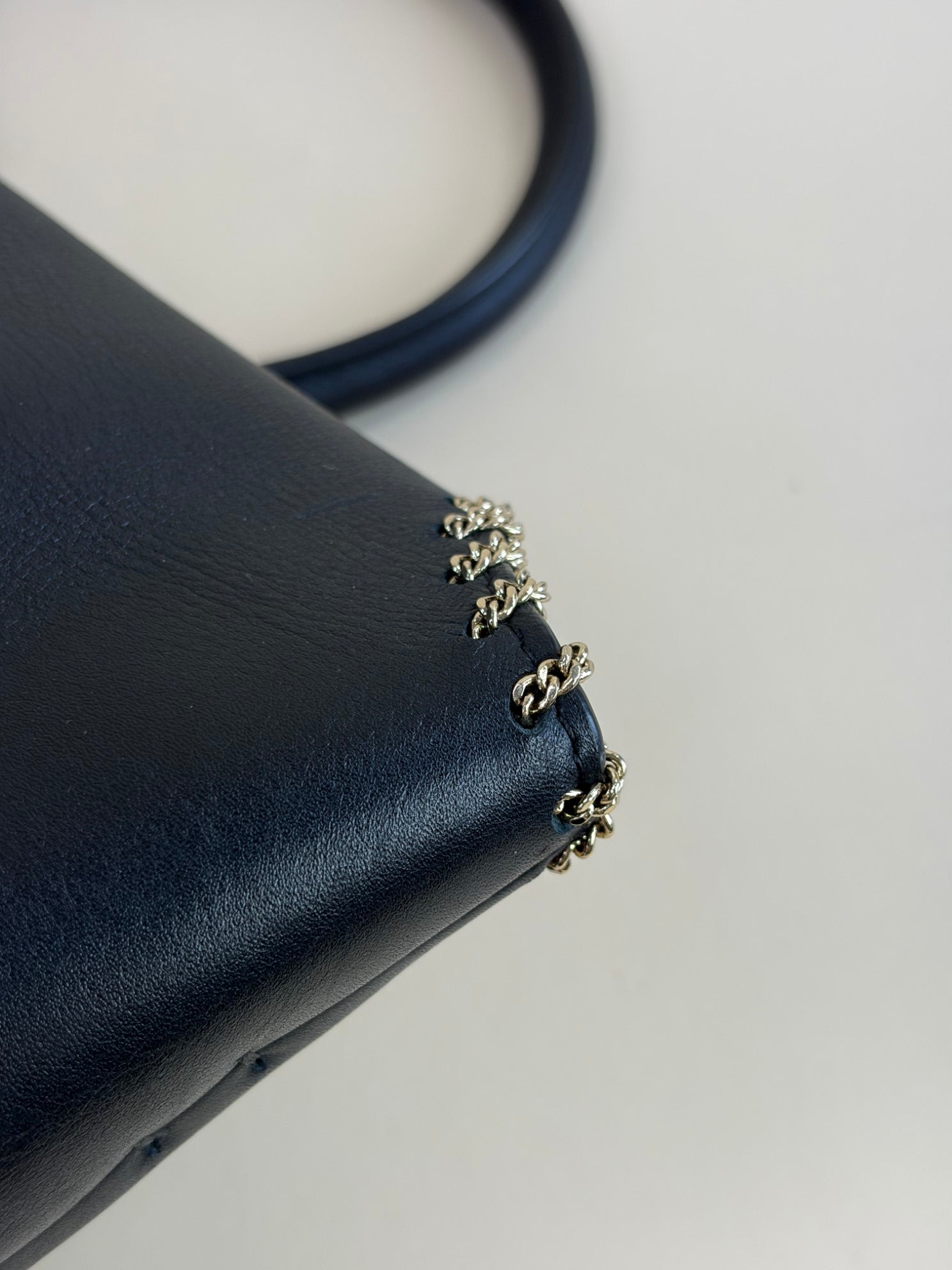 Valentin black calfskin small chain trimmed demi/une double