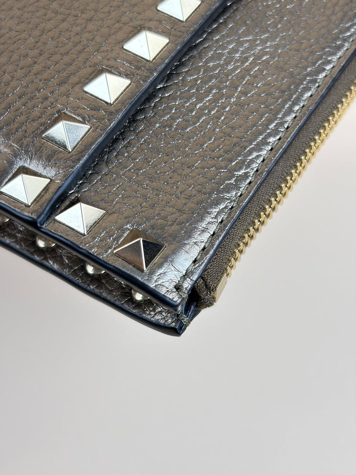 Valentino metallic gold pebbled calfskin rock stud medium zip pouch