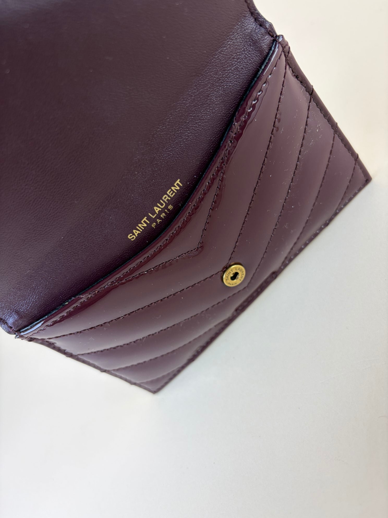 YSL Burgundy Cassandre Matelasse Fragments Flap Card Case