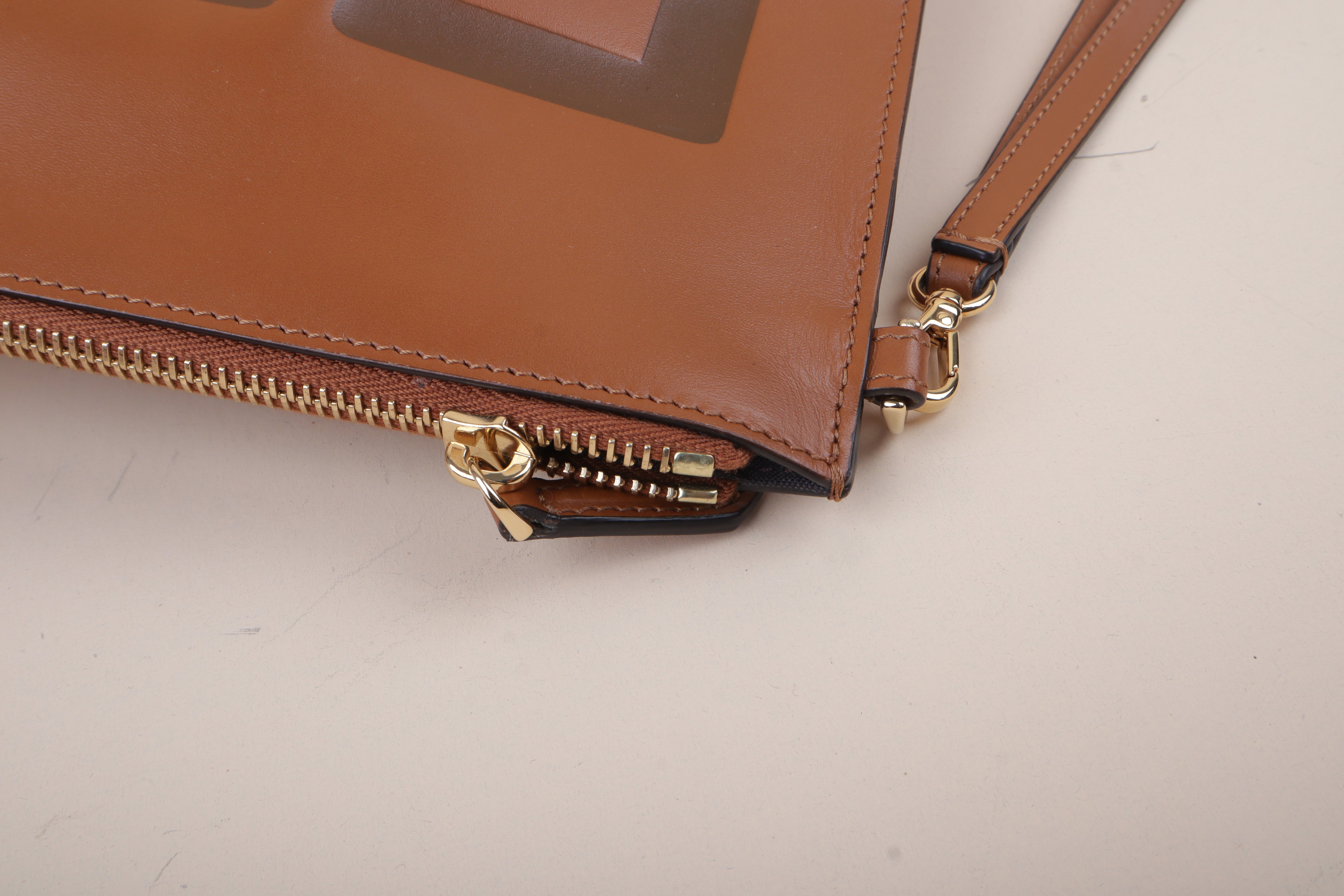 Fendi vitello logo embossed large Clutch