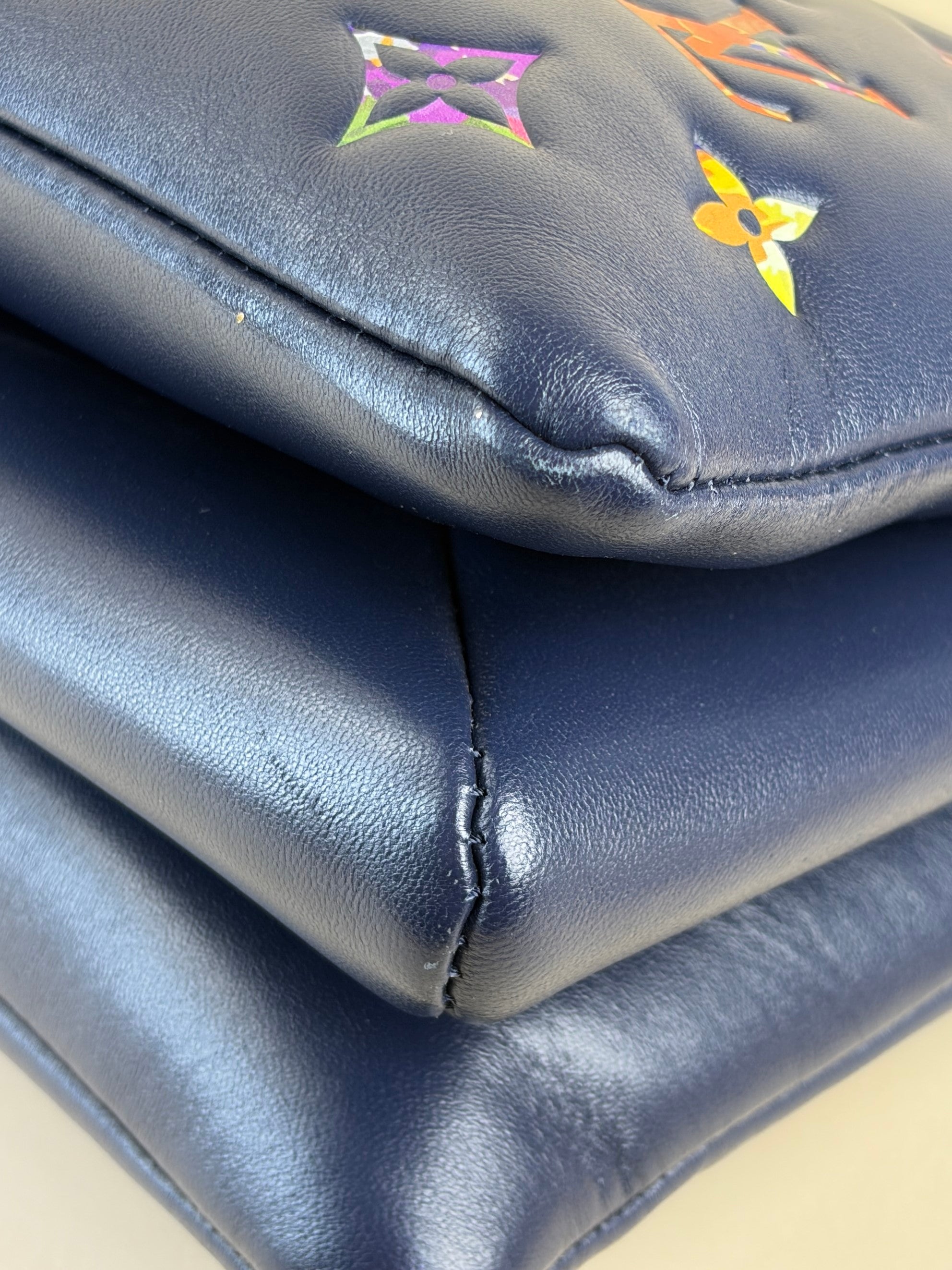 louis Vuitton navy blue lambskin embossed monogram lv garden coissin pm
