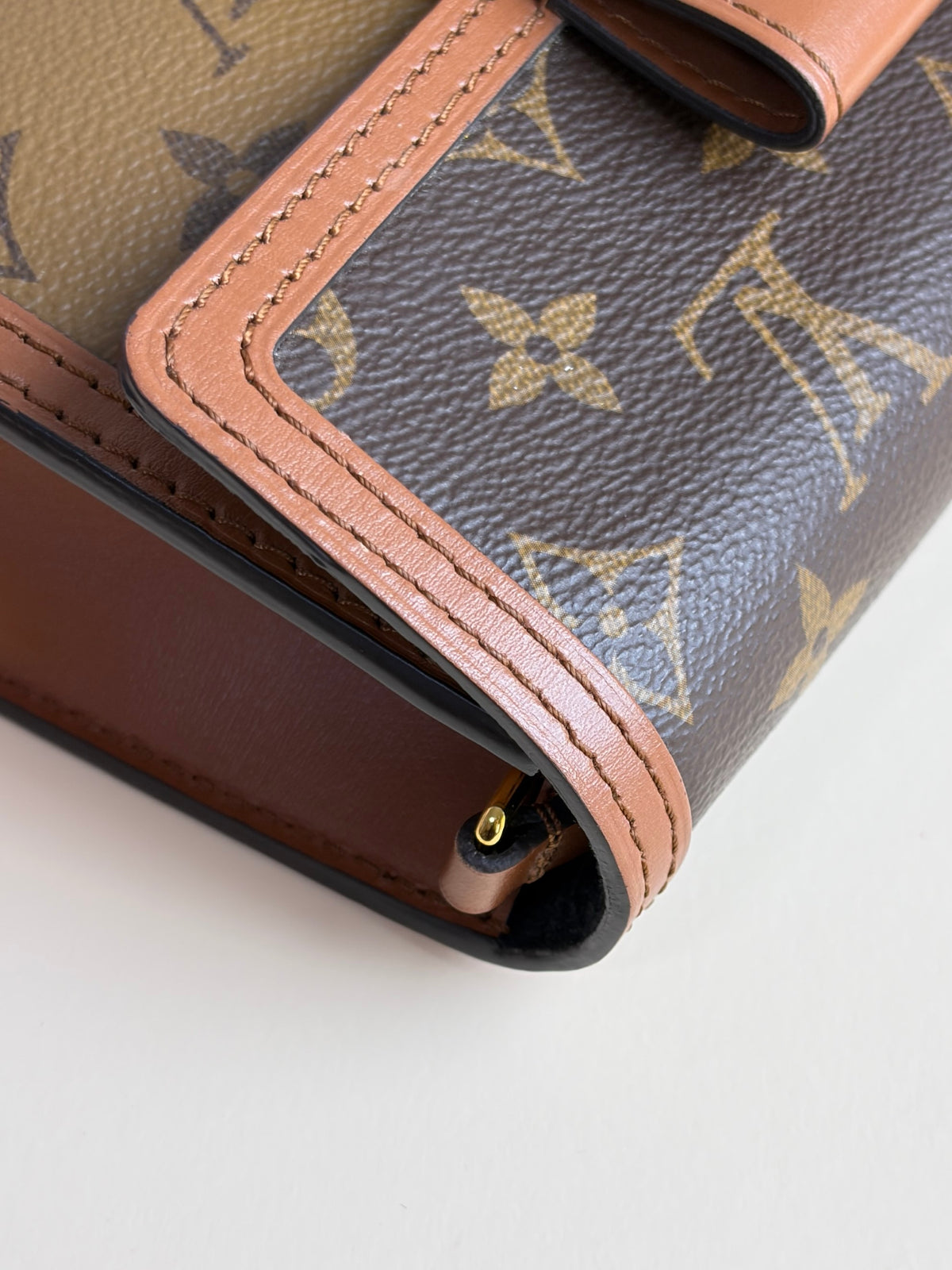 Louis Vuitton Reverse Monogram Dauphine chain wallet