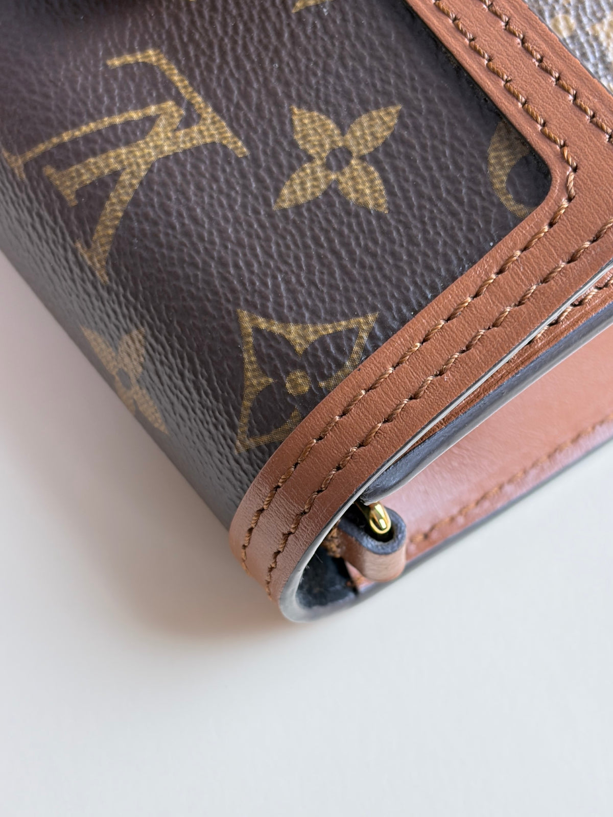 Louis Vuitton Reverse Monogram Dauphine chain wallet