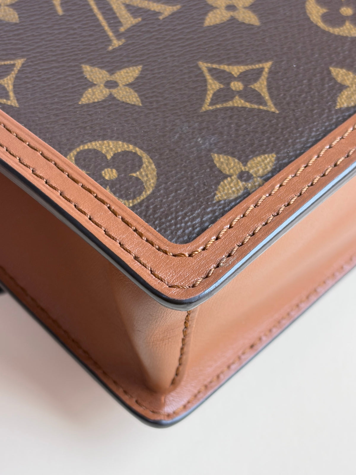Louis Vuitton Reverse Monogram Dauphine chain wallet