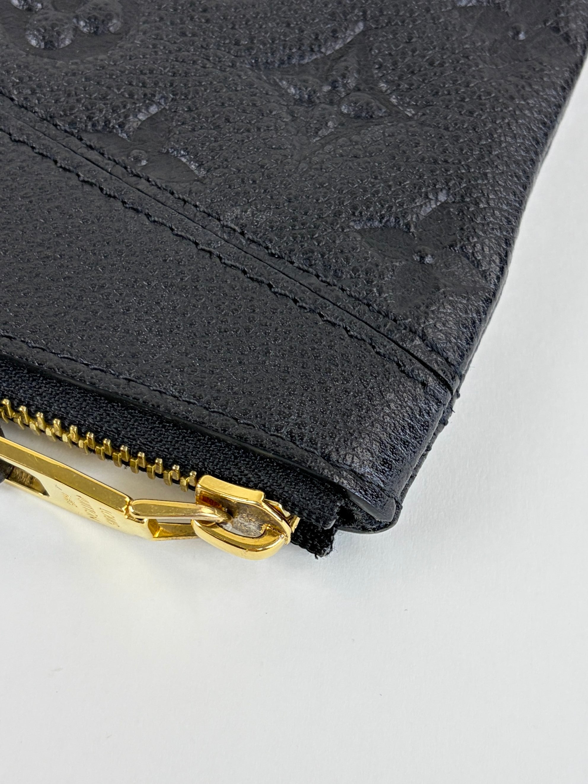 Louis Vuitton Black Monogram Empreinte leather daily pouch