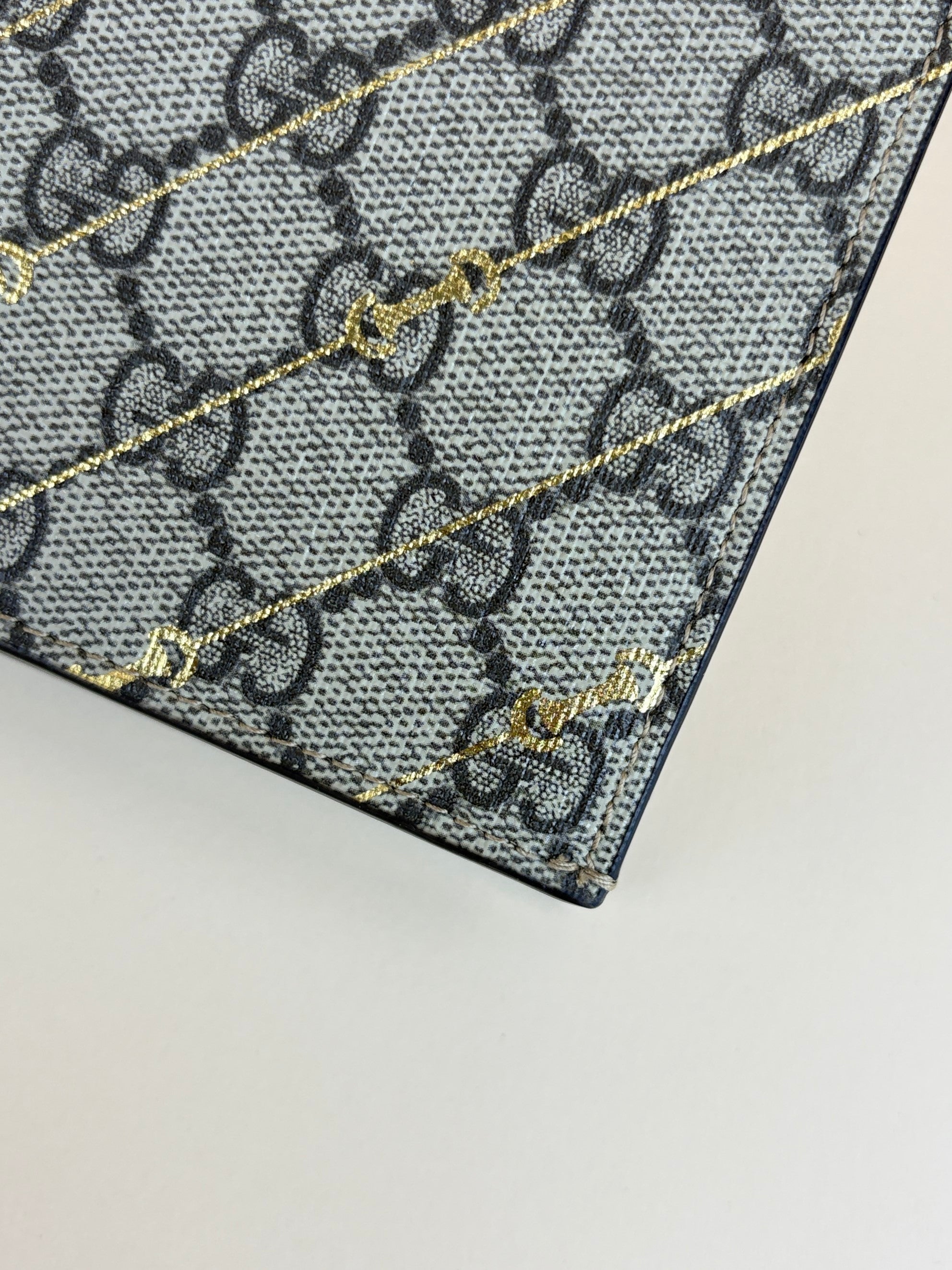 Gucci beige gg supreme monogram canvas and calfskin with gold horse bit print pouch