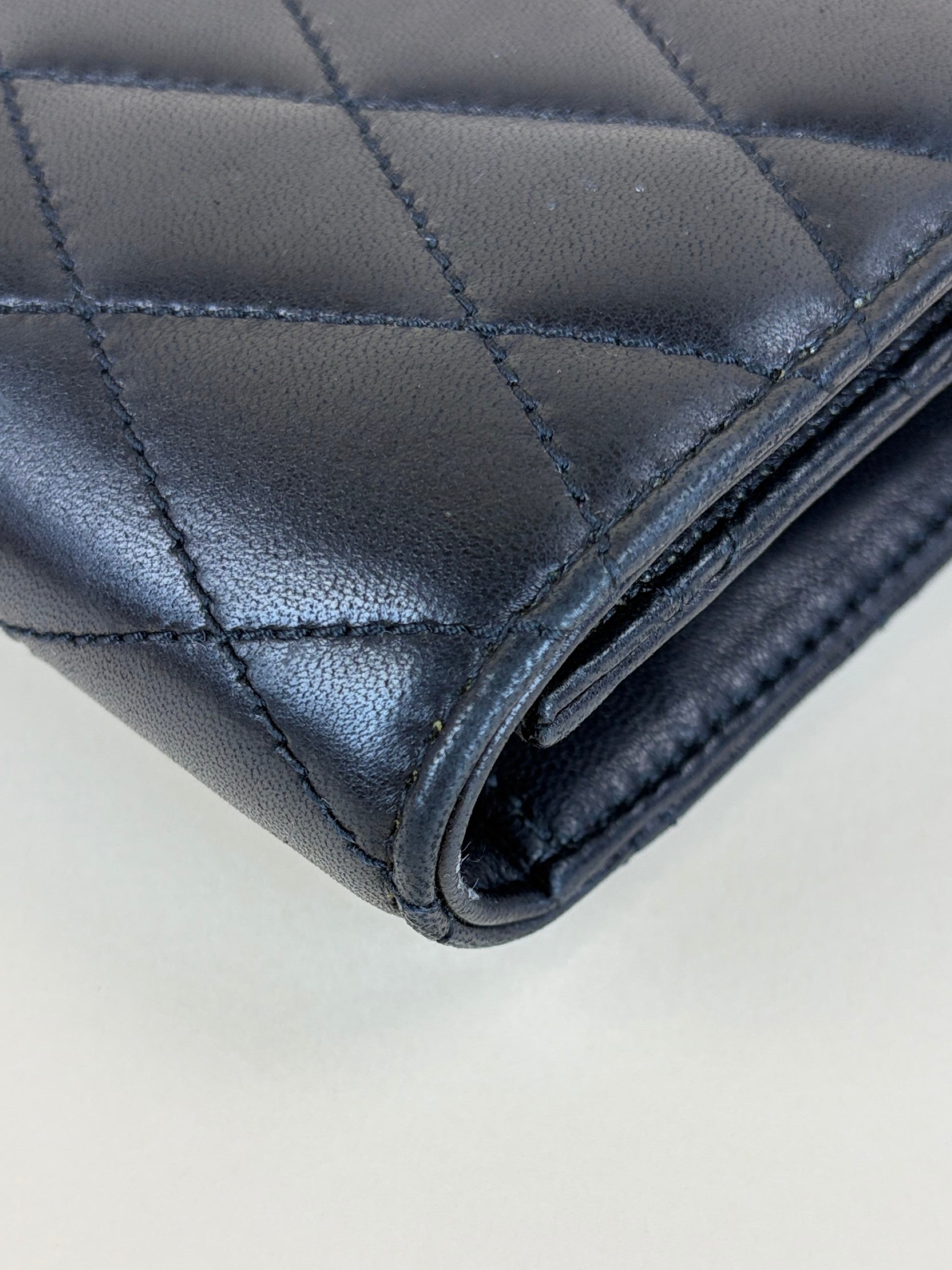 ysl black lambskin quilted Kate clutch
