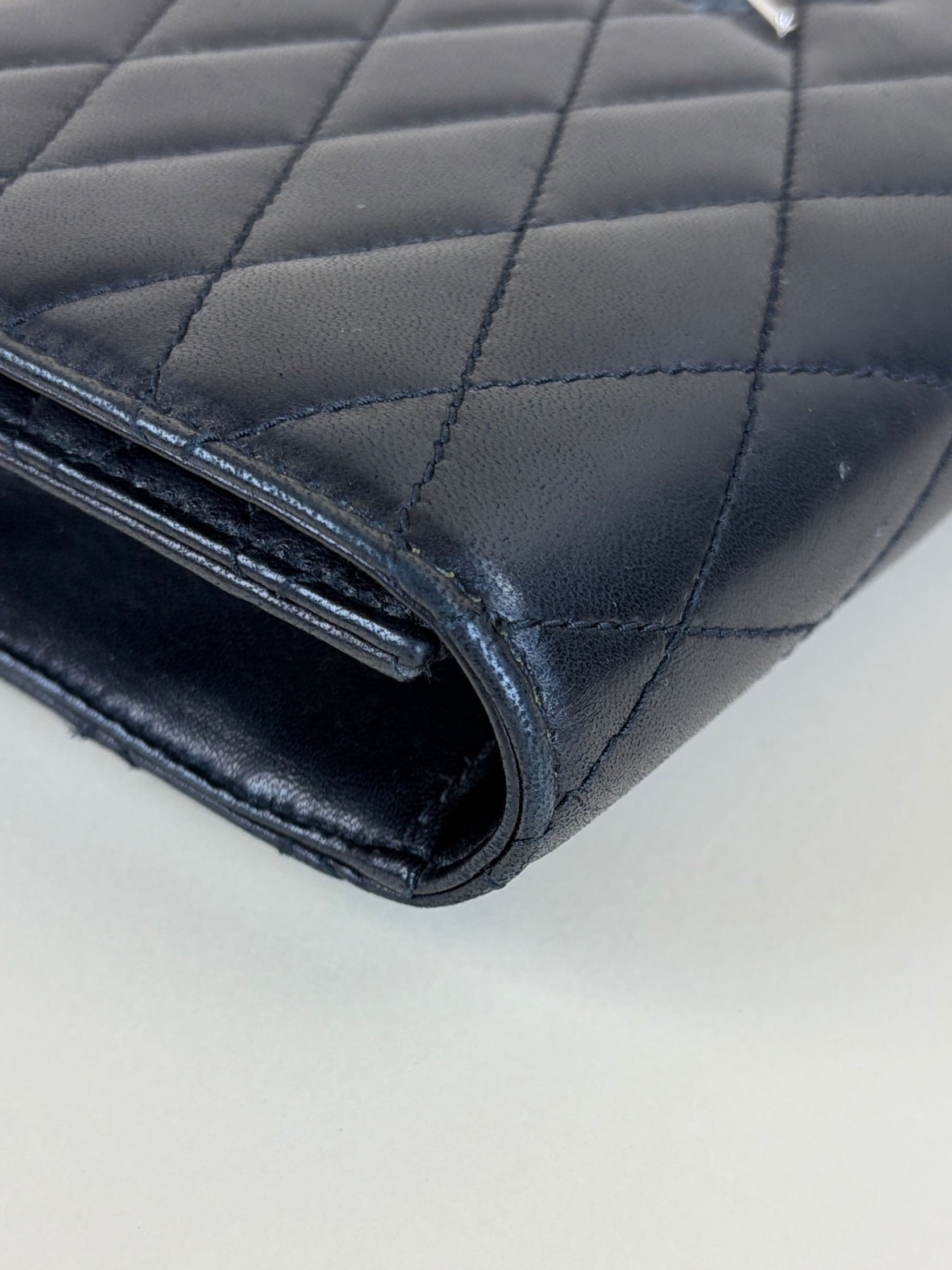 ysl black lambskin quilted Kate clutch