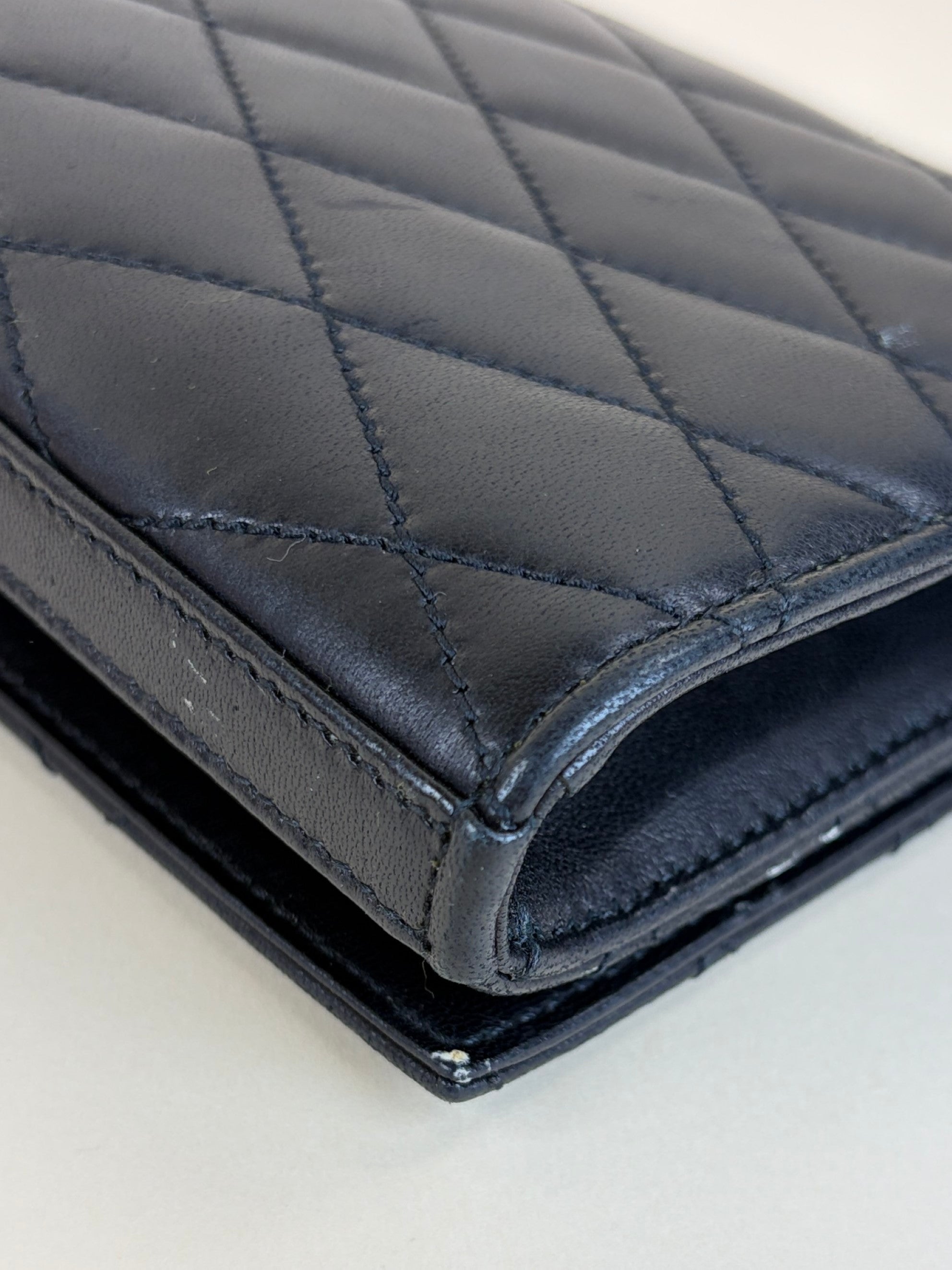 ysl black lambskin quilted Kate clutch