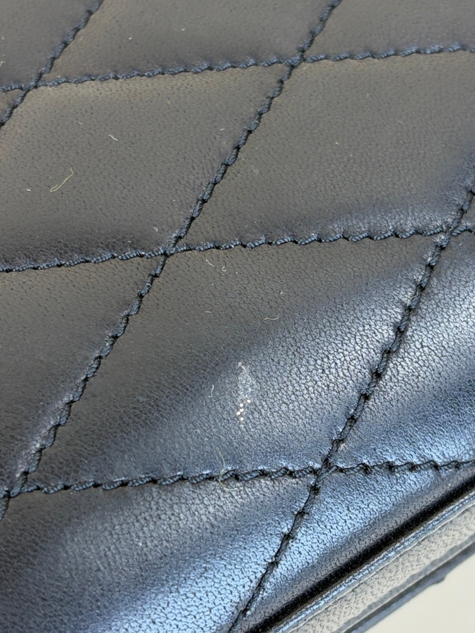ysl black lambskin quilted Kate clutch