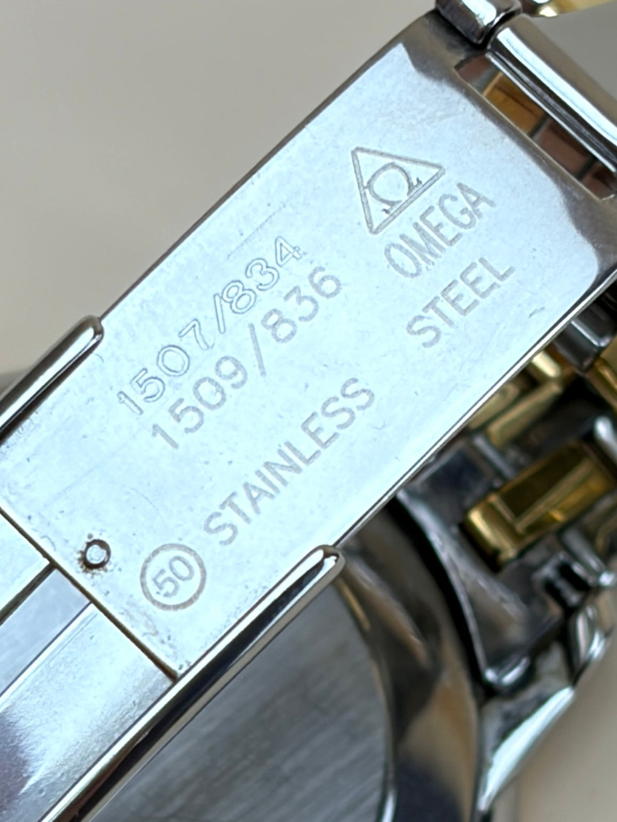 Omega stainless steel yellow gold de ville prestige date watch