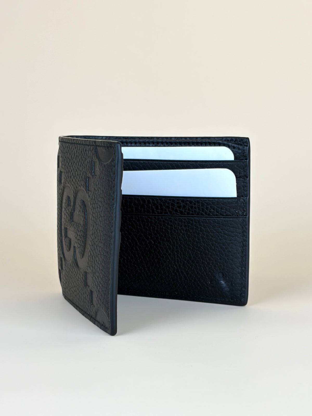 Gucci Black GG piuma calfskin jumbo embossed wallet
