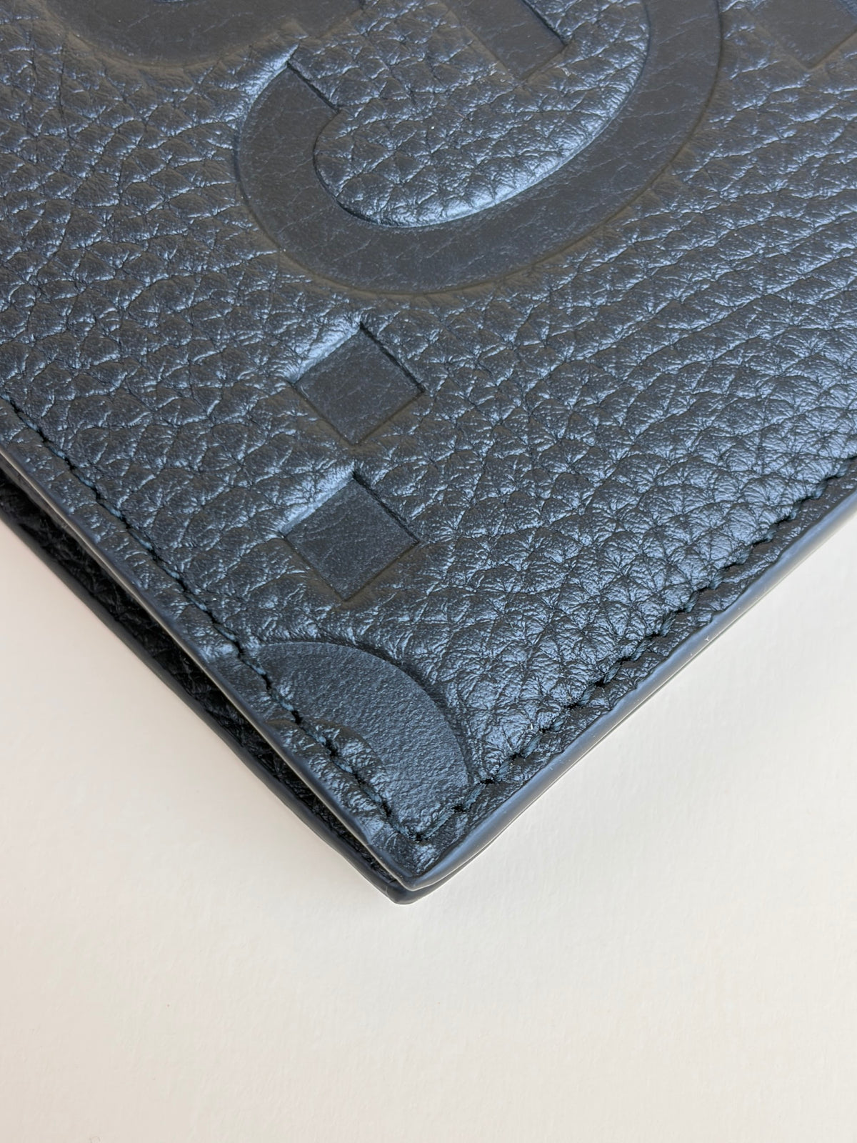 Gucci Black GG piuma calfskin jumbo embossed wallet