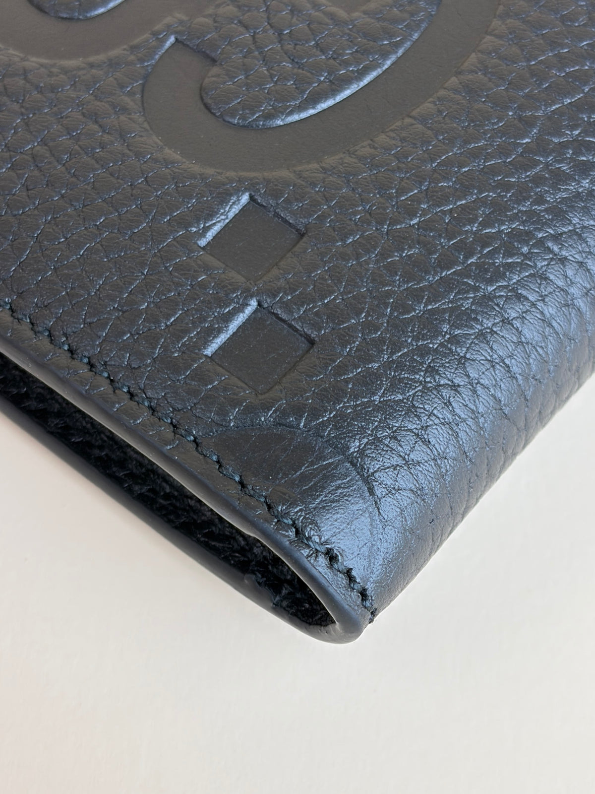 Gucci Black GG piuma calfskin jumbo embossed wallet