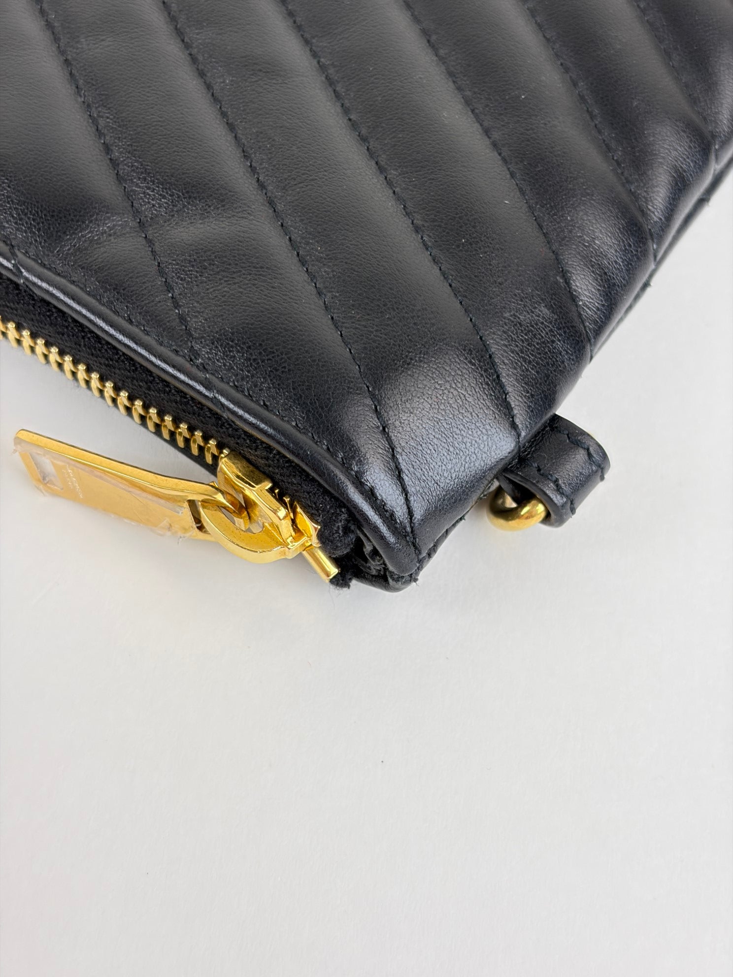 ysl black Cassandra matelassé tablet pouch