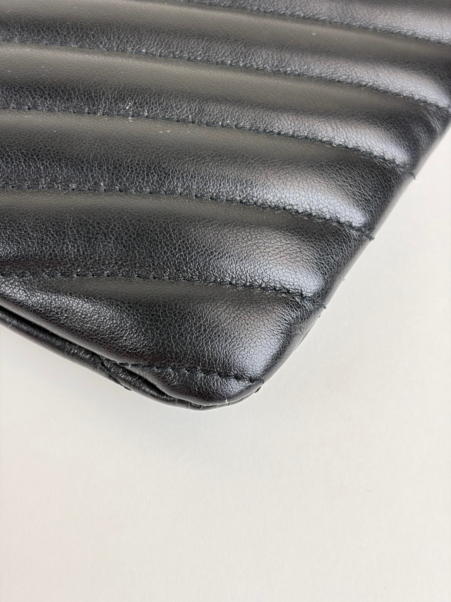 ysl black Cassandra matelassé tablet pouch